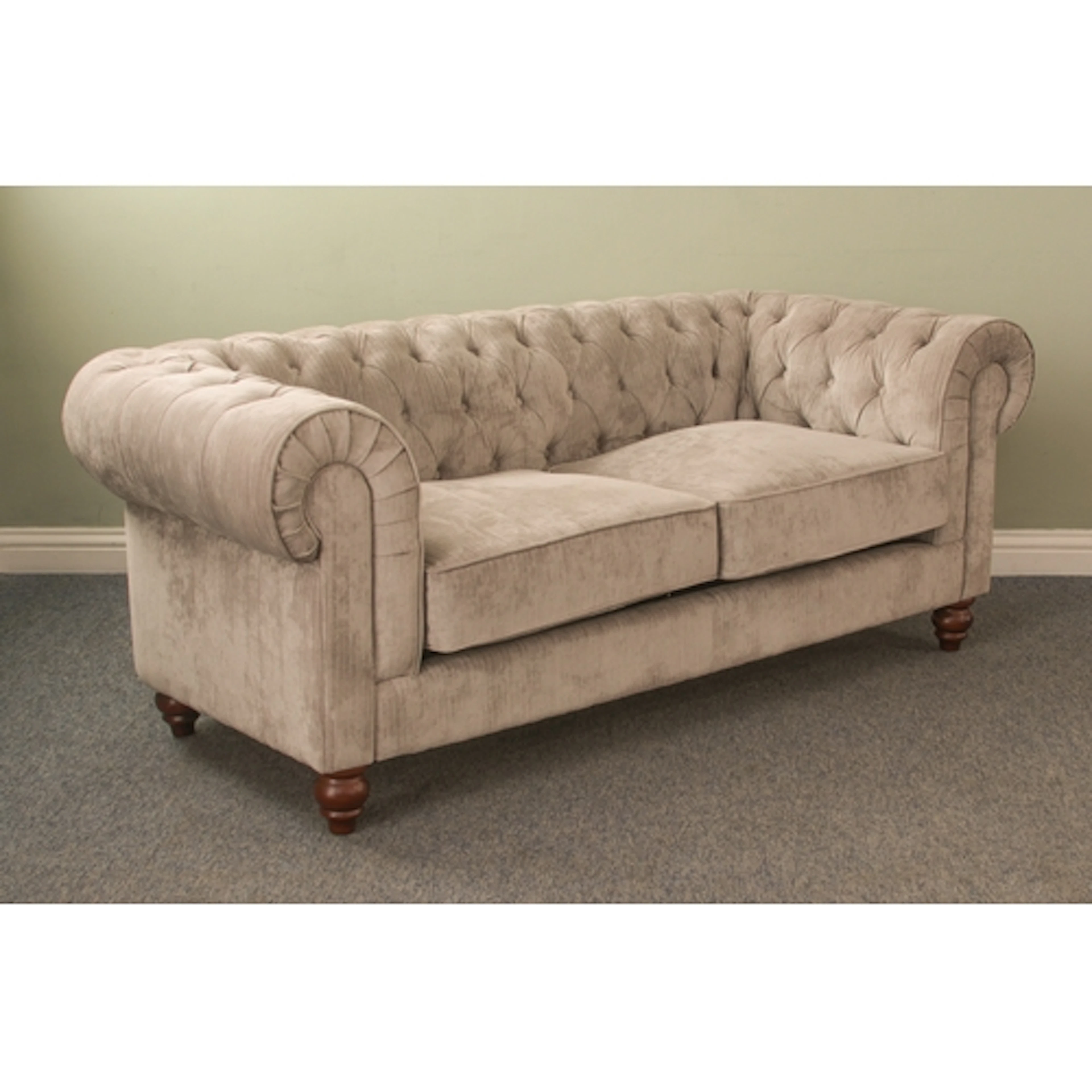 A modern Chesterfield-style sofa - upholstered in pale grey,...