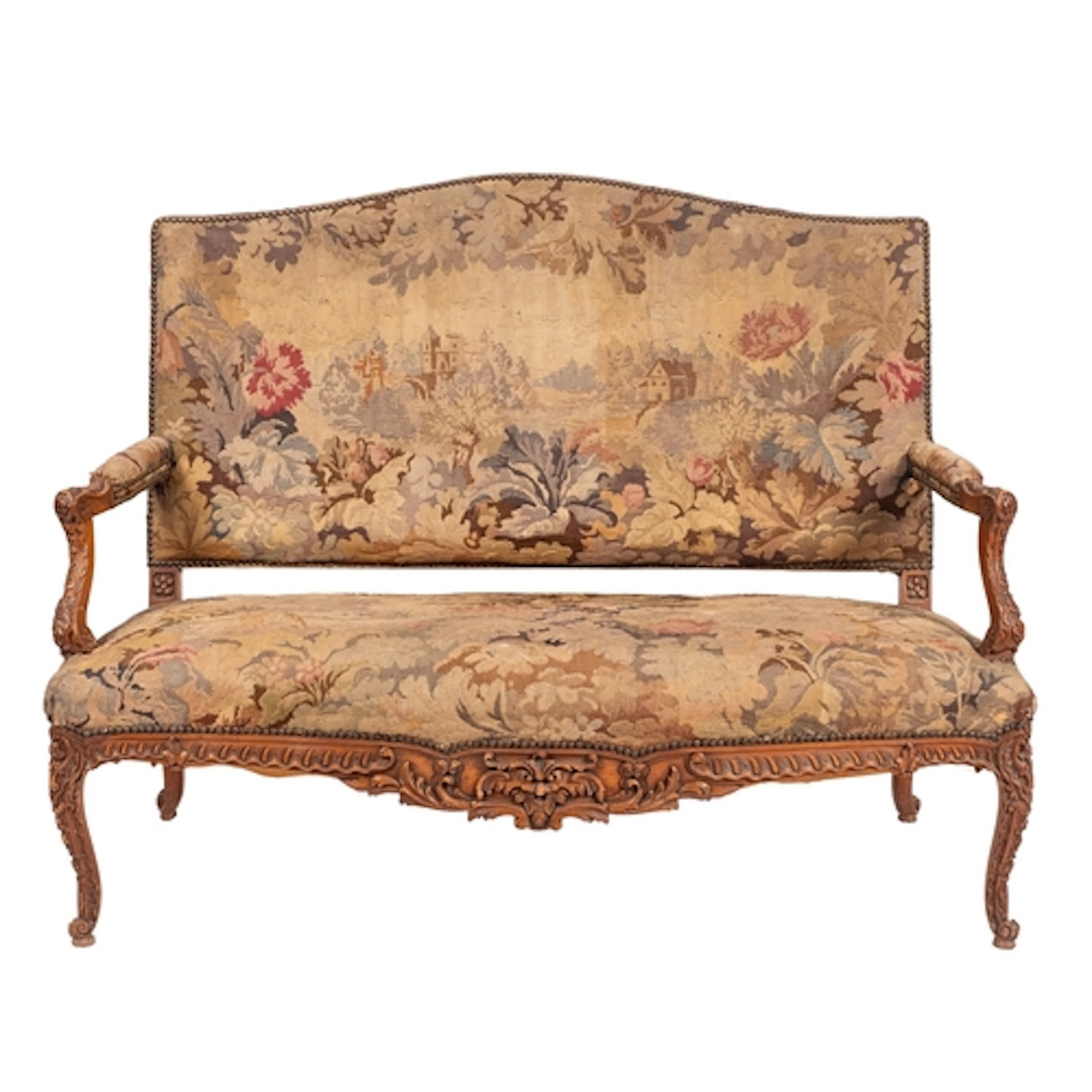 A carved mahogany and upholstered settee in Rococo Revival t...
