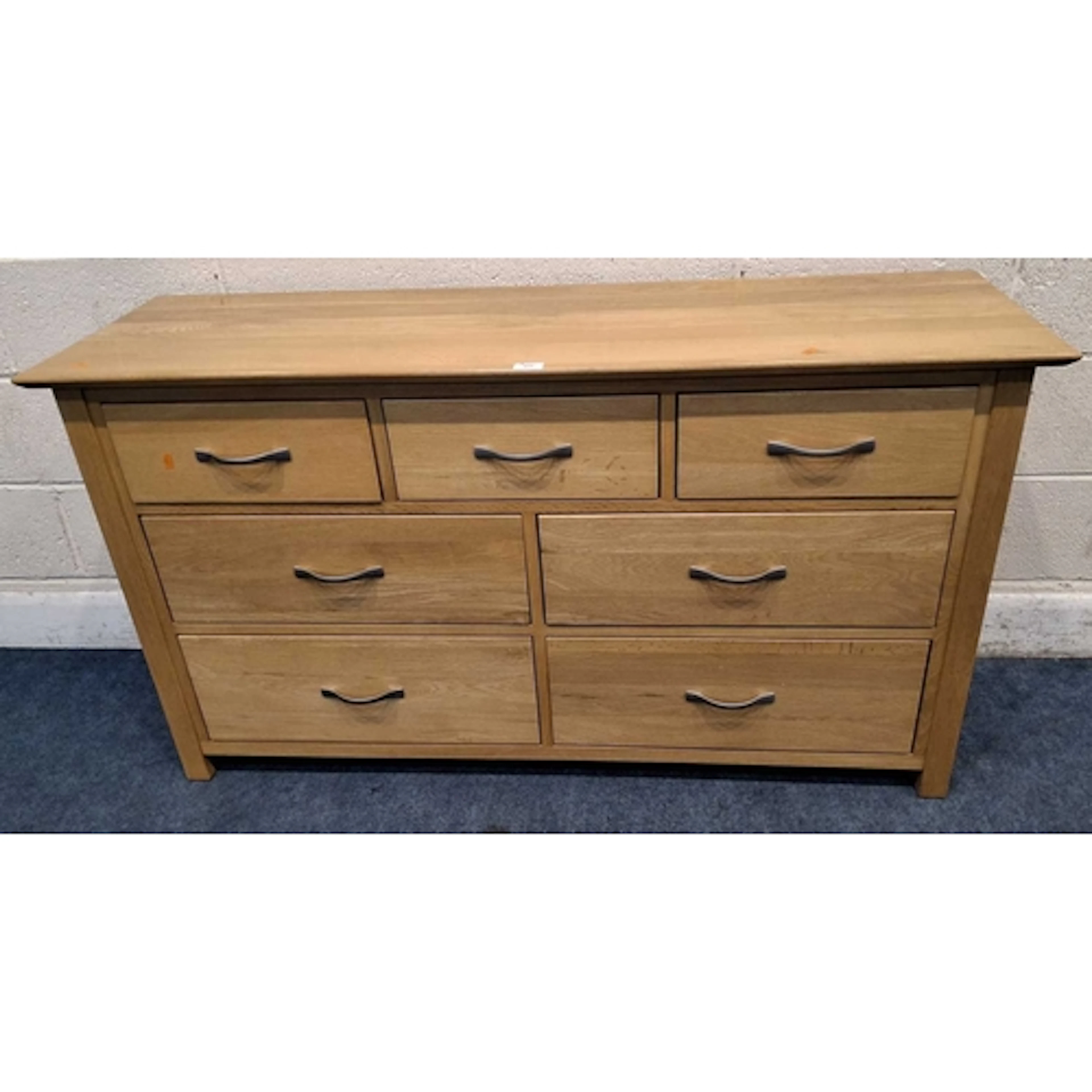 A MODERN LIGHT OAK SIDEBOARD, fitted with three short over f...
