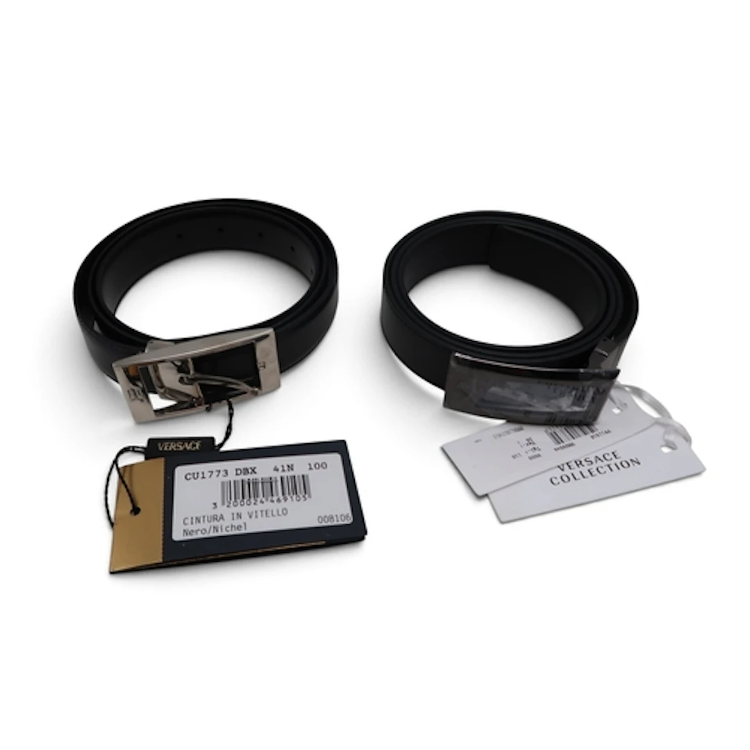 A Versace black leather belt with silver-tone buckle, togeth...