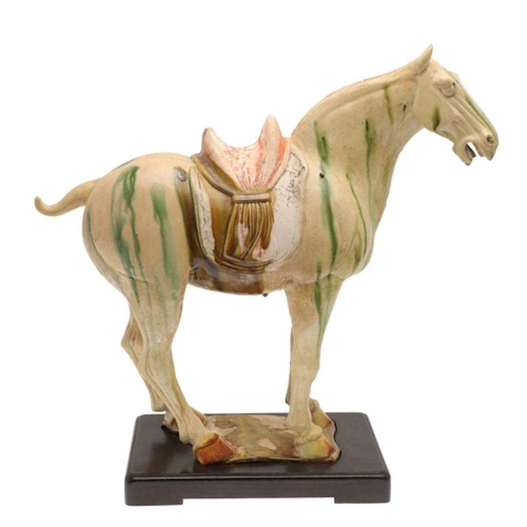 LARGE CHINESE TANG DYNASTY HORSE. Tang Dynasty, a large sanc...