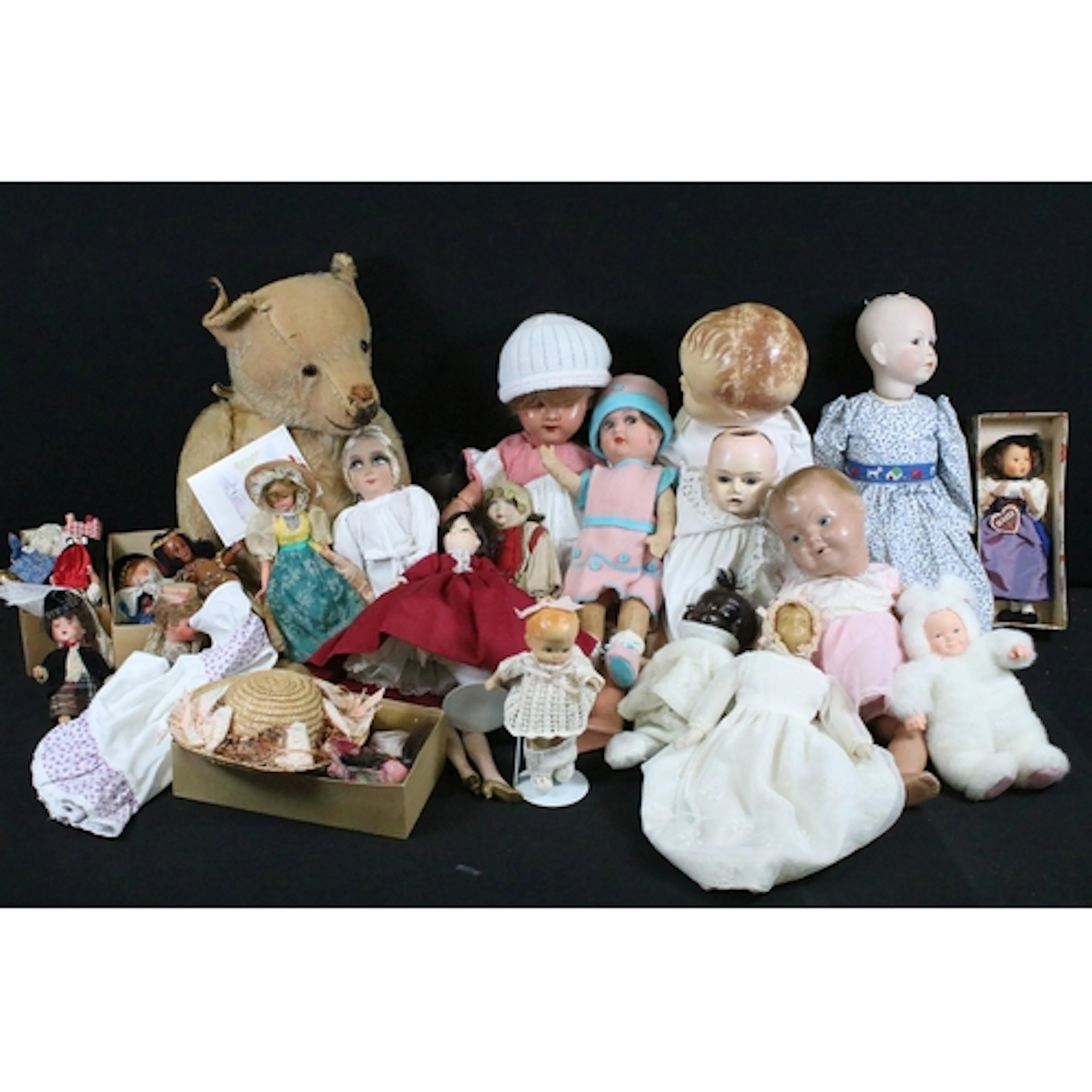 Collection of mixed dolls to include various compositions in...