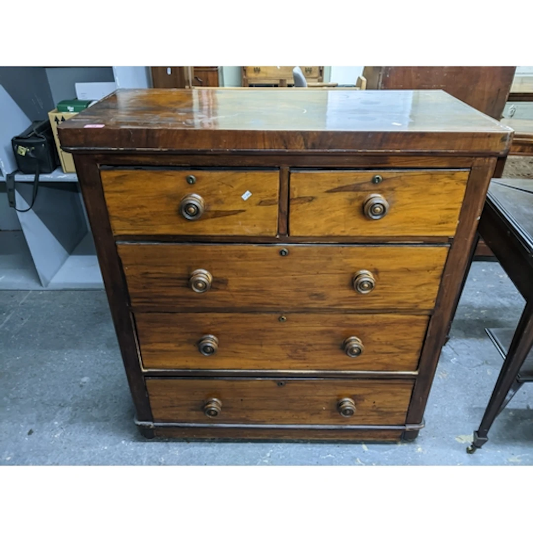 An early 19th century walnut chest of two short over three l...
