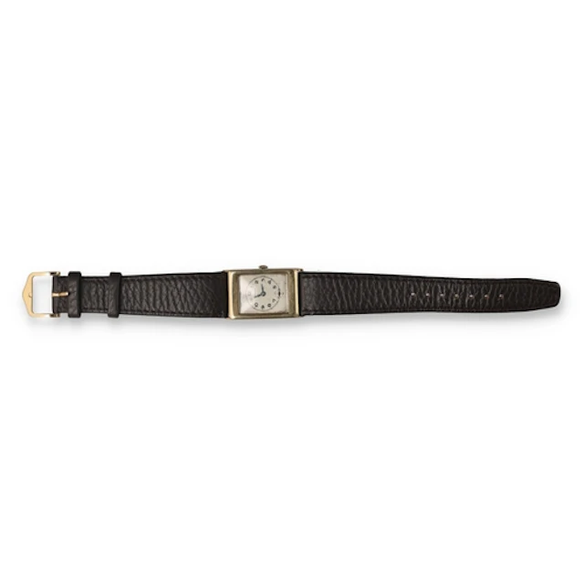 A 9CT GOLD CRUSADER WATCH With leather strap