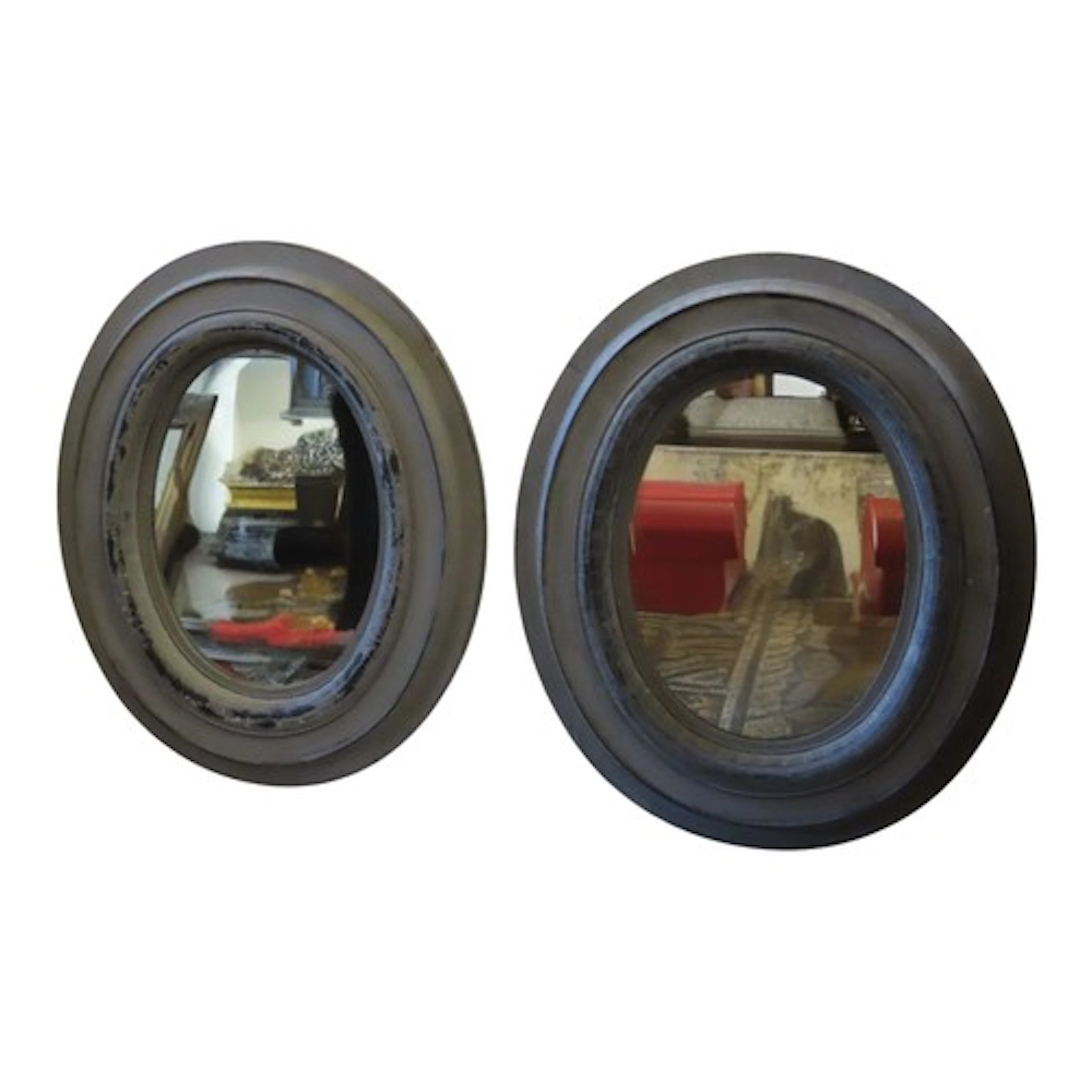 A Pair of contemporary oval wall mirrors with painted light ...