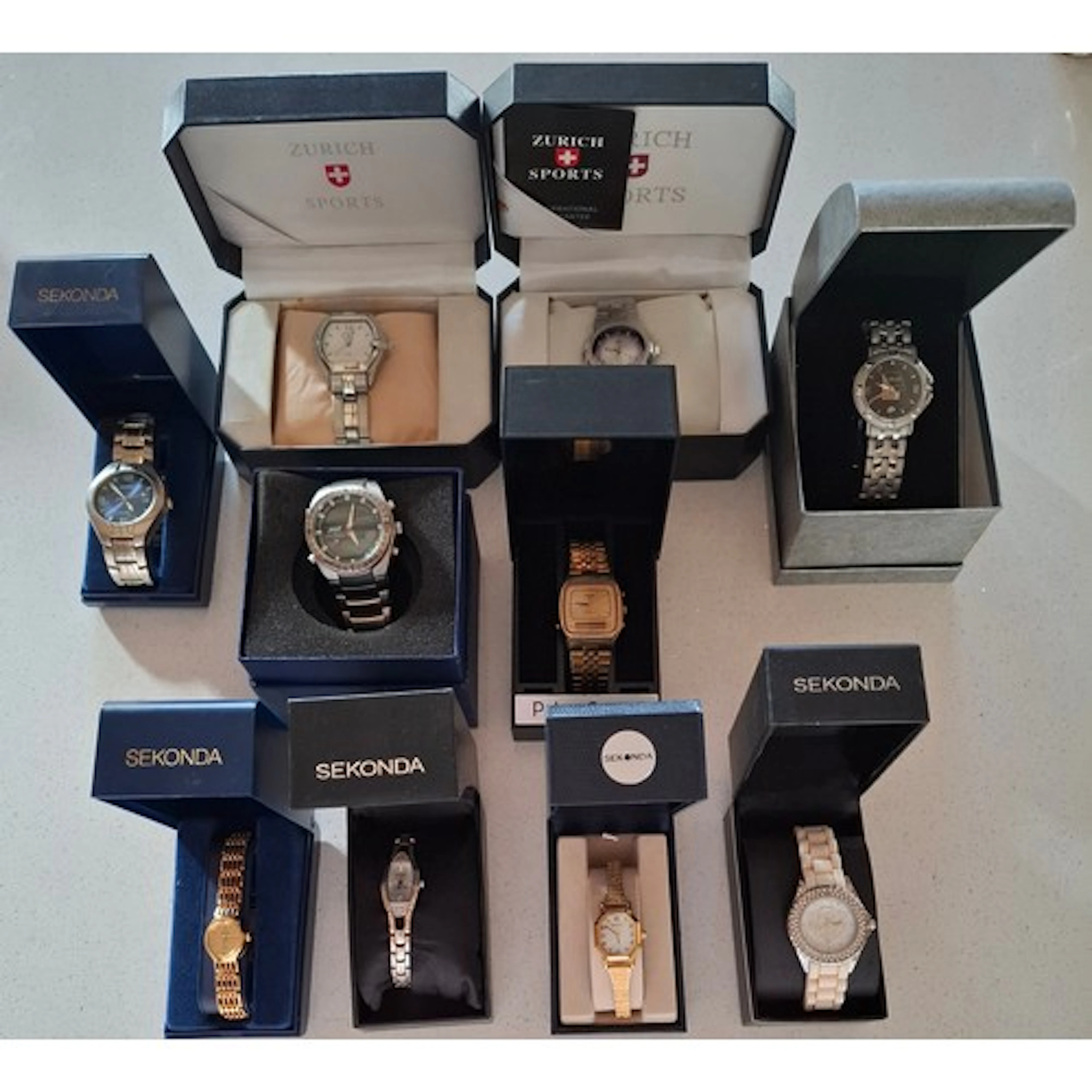 A quantity of boxed gents watches to include 2x Zurich Sport...