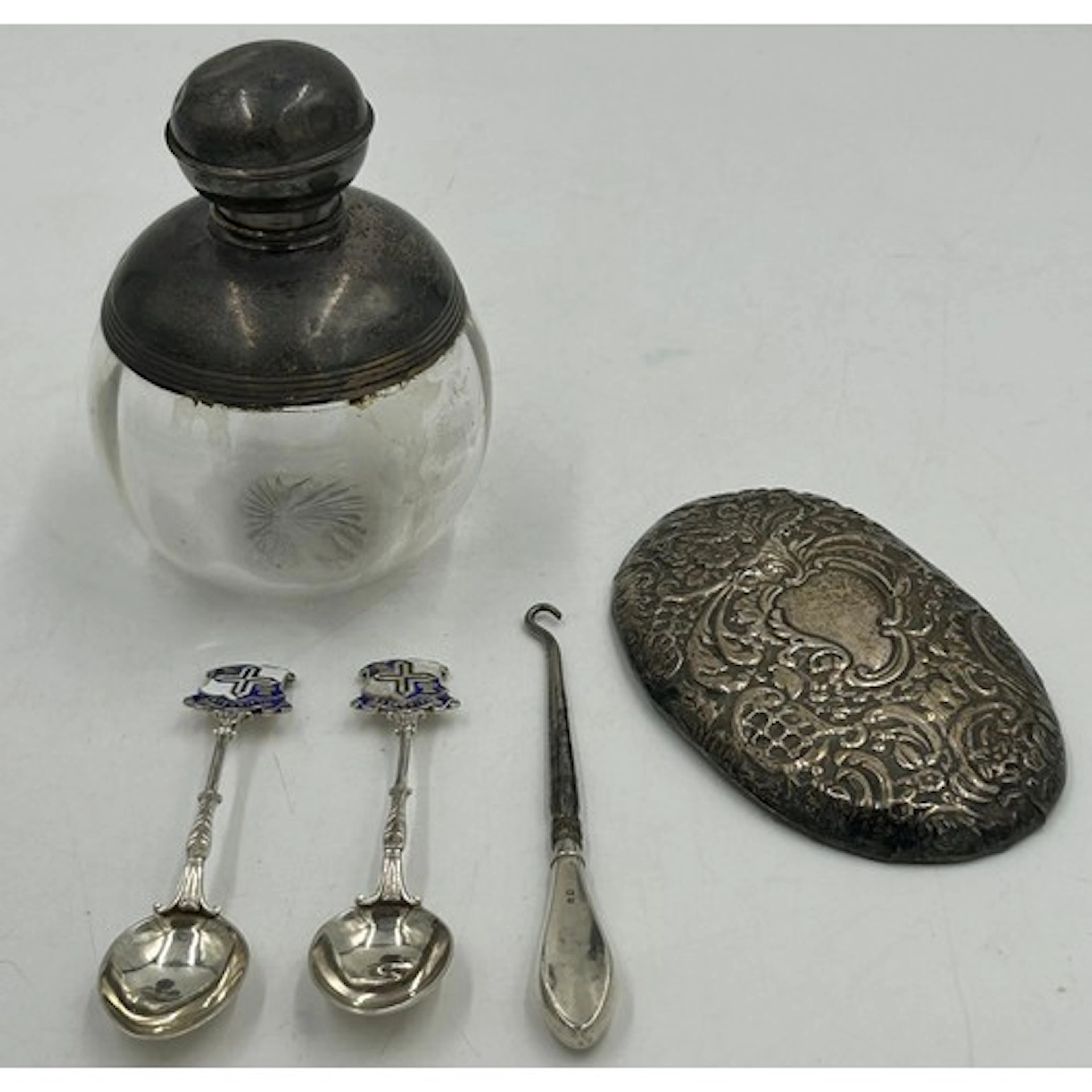 Silver to include a glass scent bottle with silver top, deco...