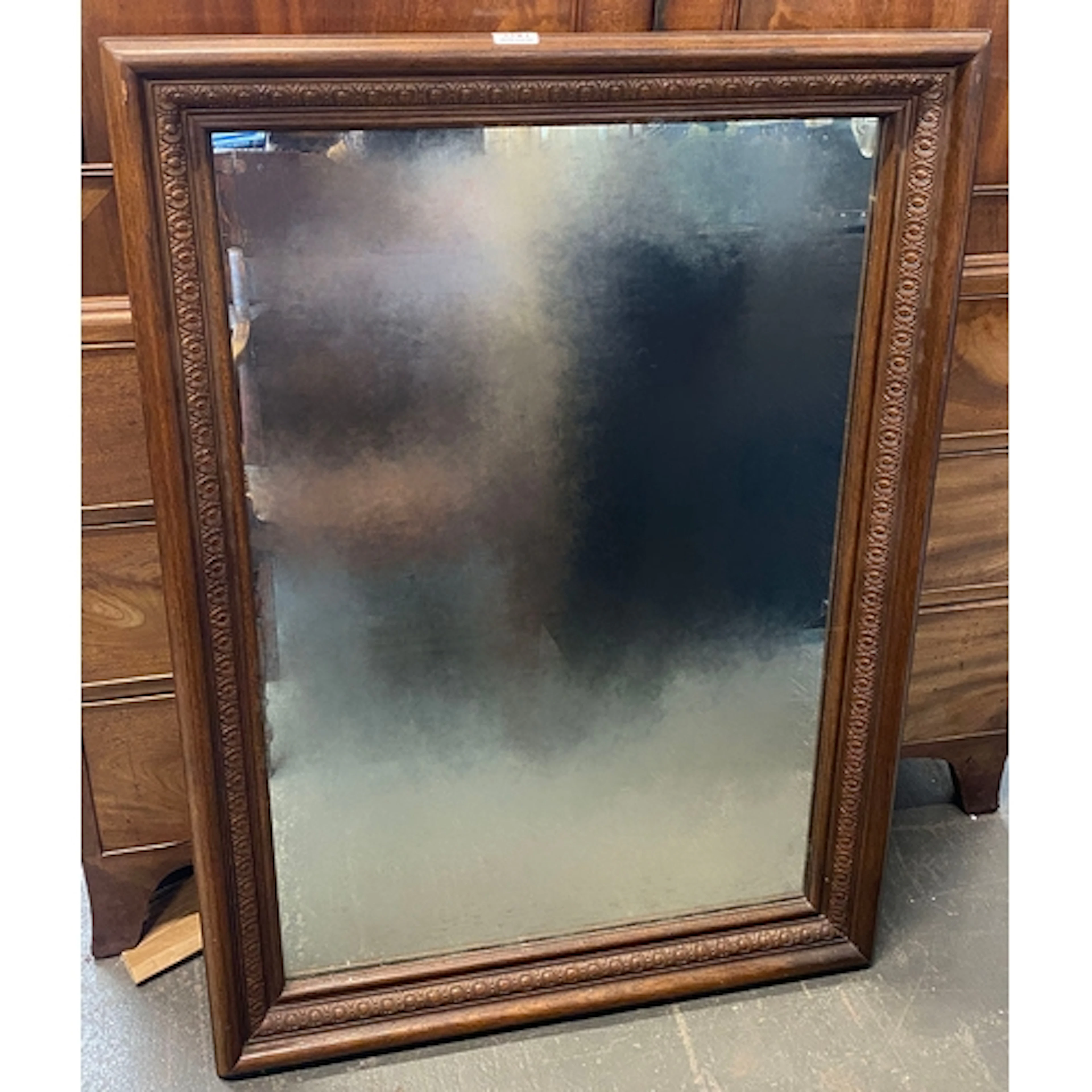 A rectangular wall mirror, 80x110cm