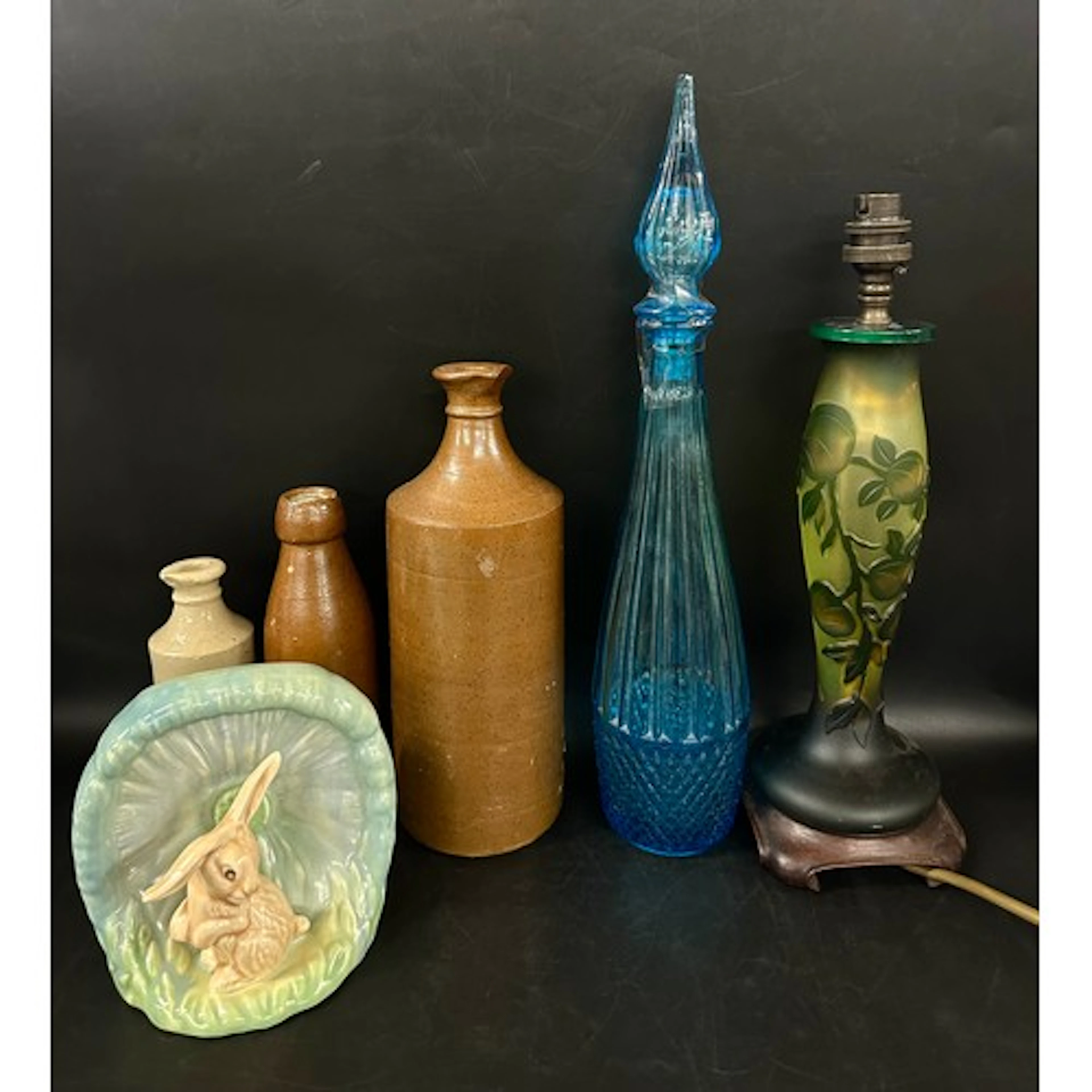 Assorted items comprising of two salt glazed stoneware bottl...