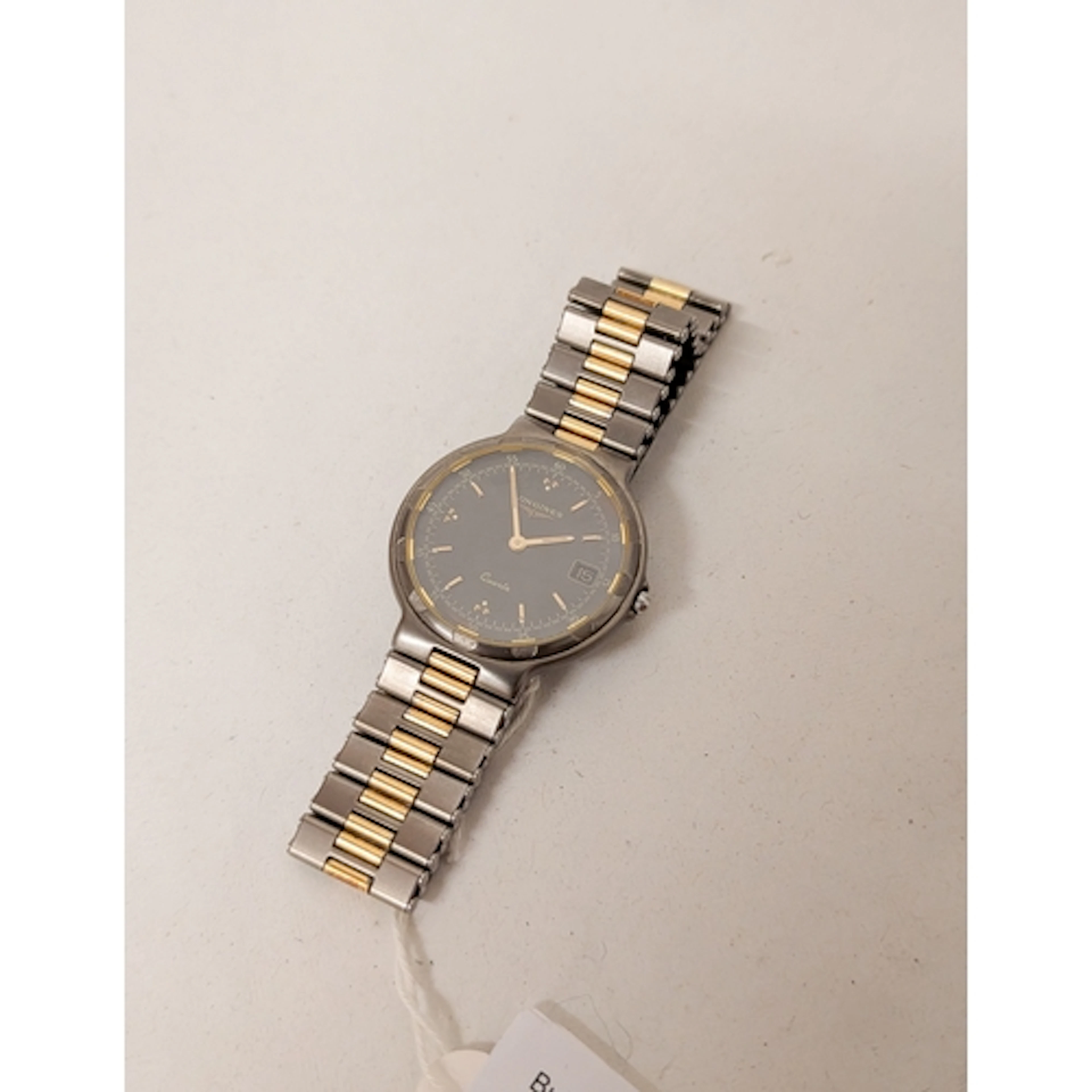 A Longines Conquest quartz date wristwatch on a stainless st...
