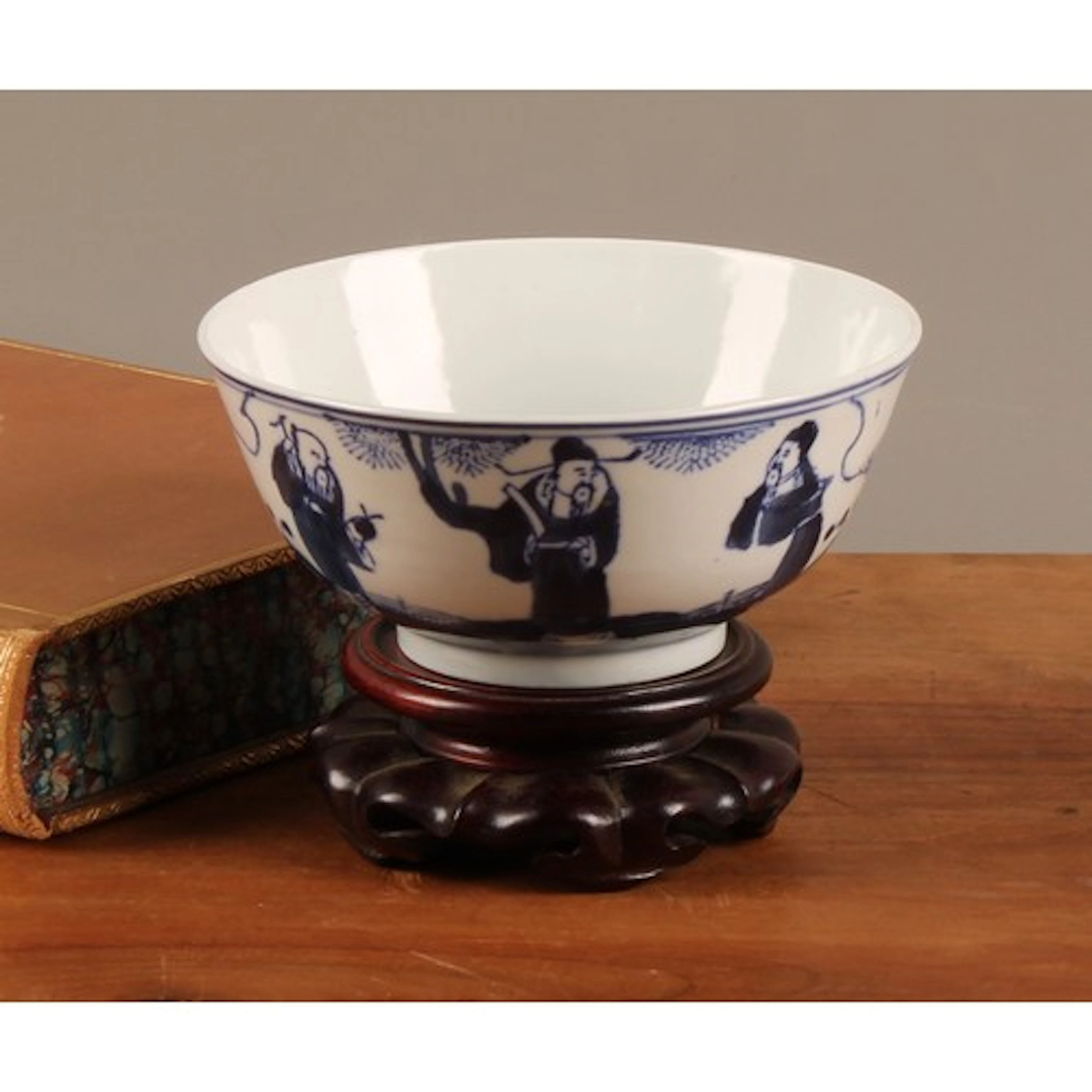 A 19th century Chinese circular bowl, painted in tones of un...