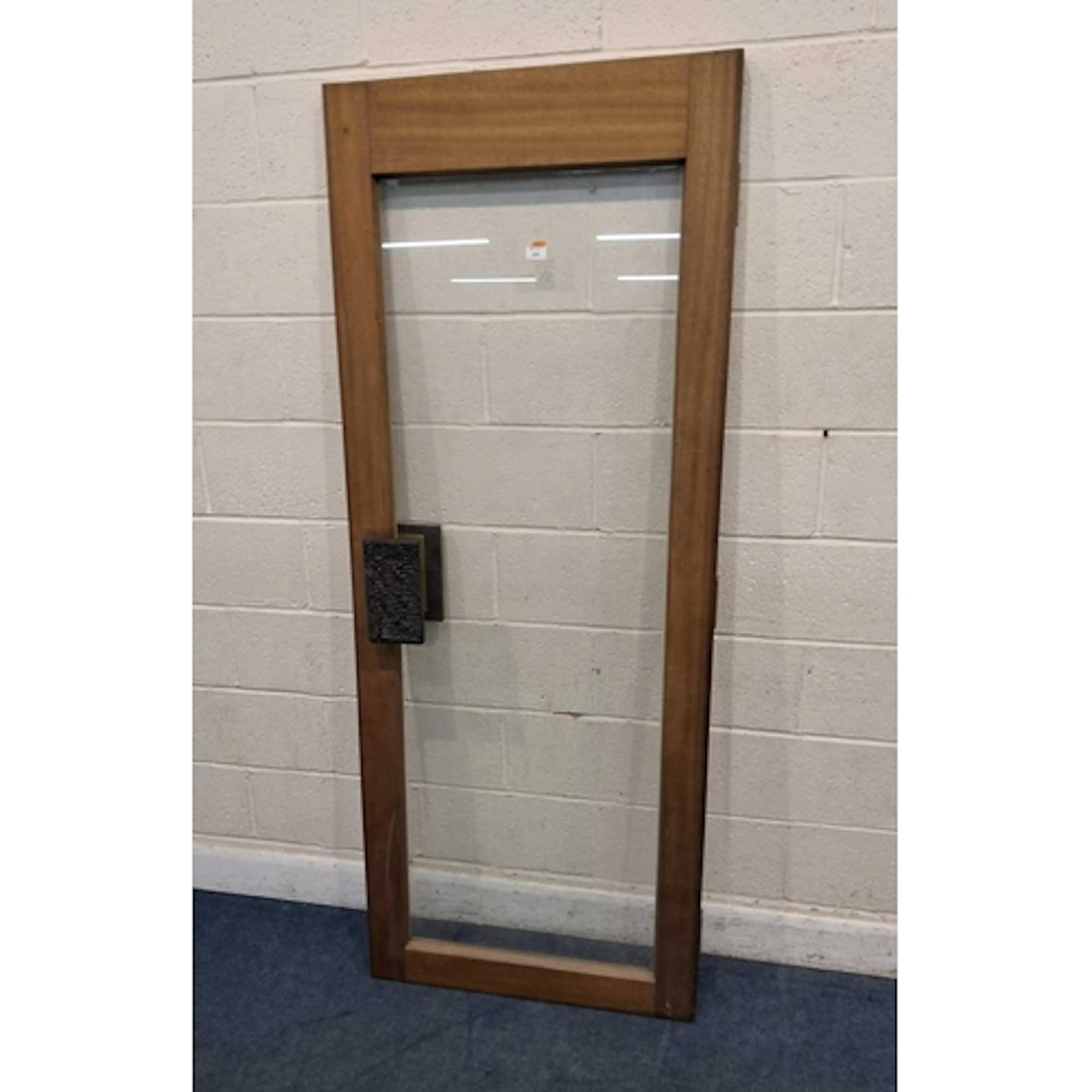 A MAHOGANY FRAMED INTERNAL DOOR, with a central glass pane a...