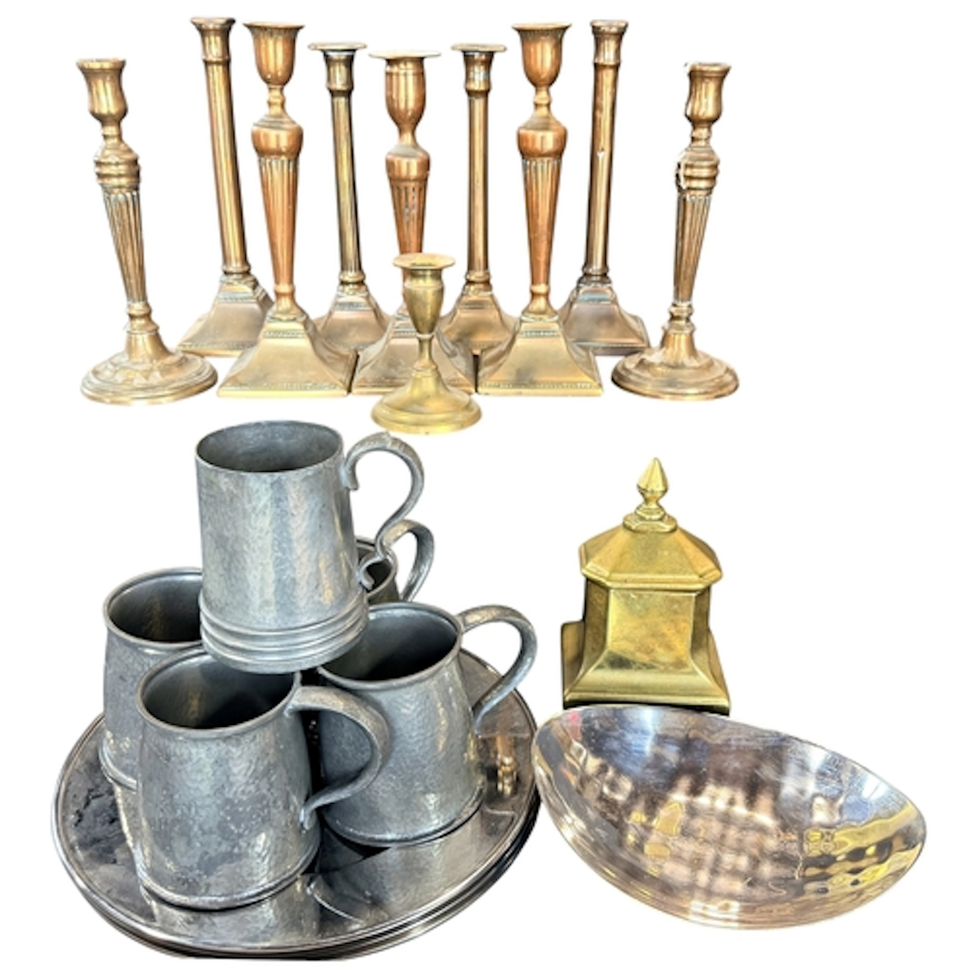 A collection of various metal ware to include four pairs and...