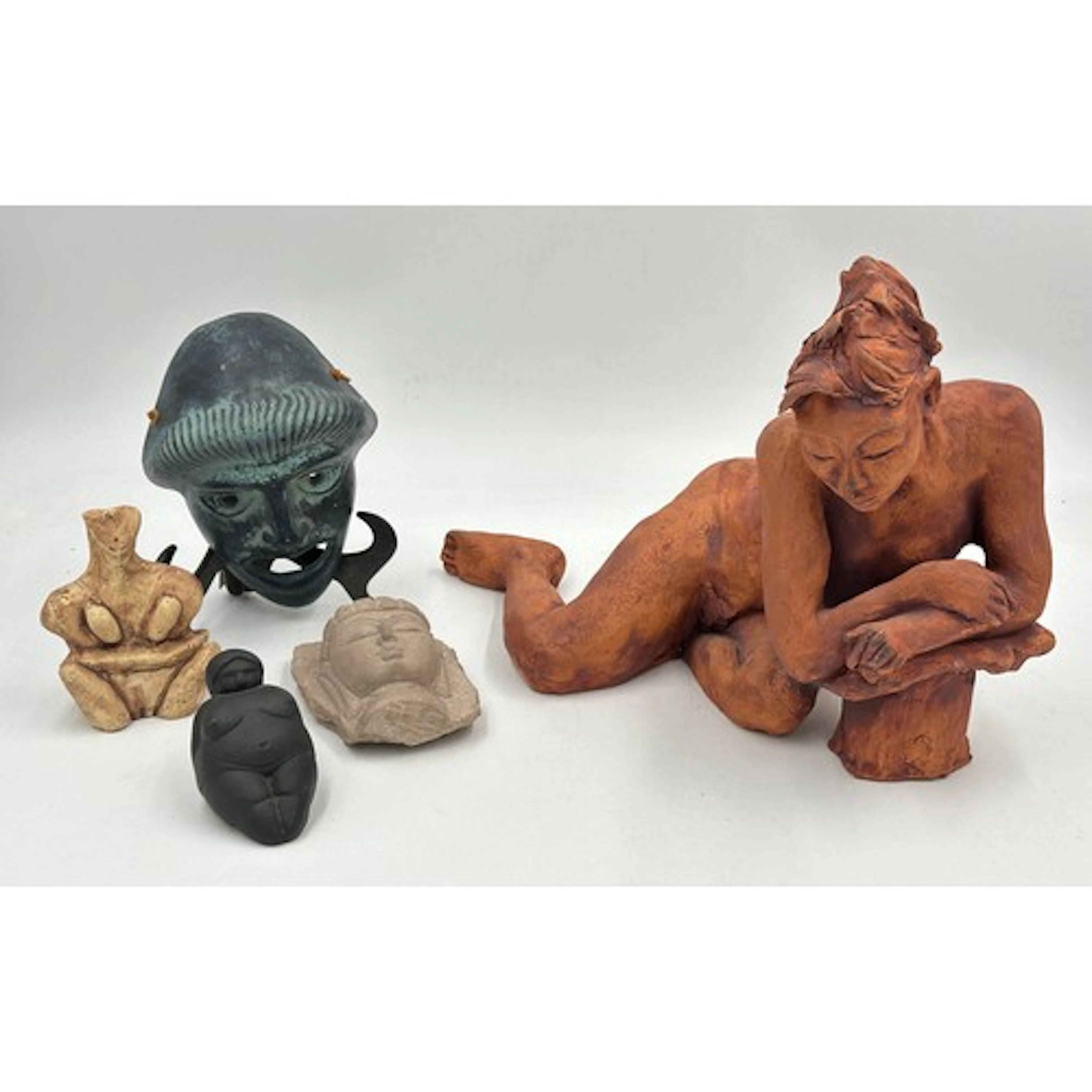 A terracotta sculpture of 'Lena', a reclining nude female ex...