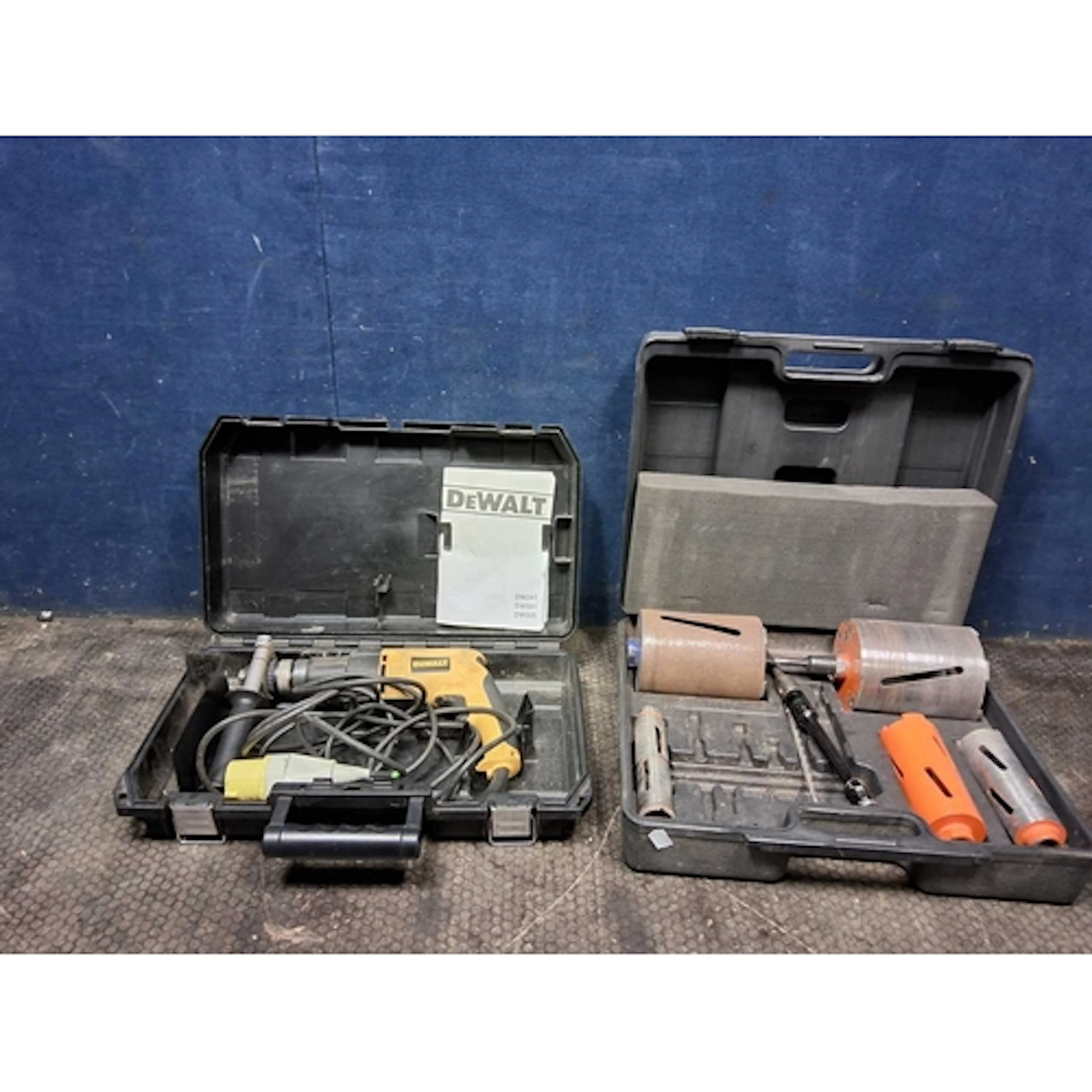 A DeWALT DW505L XW 110V HAMMER DRILL in case and a case core...