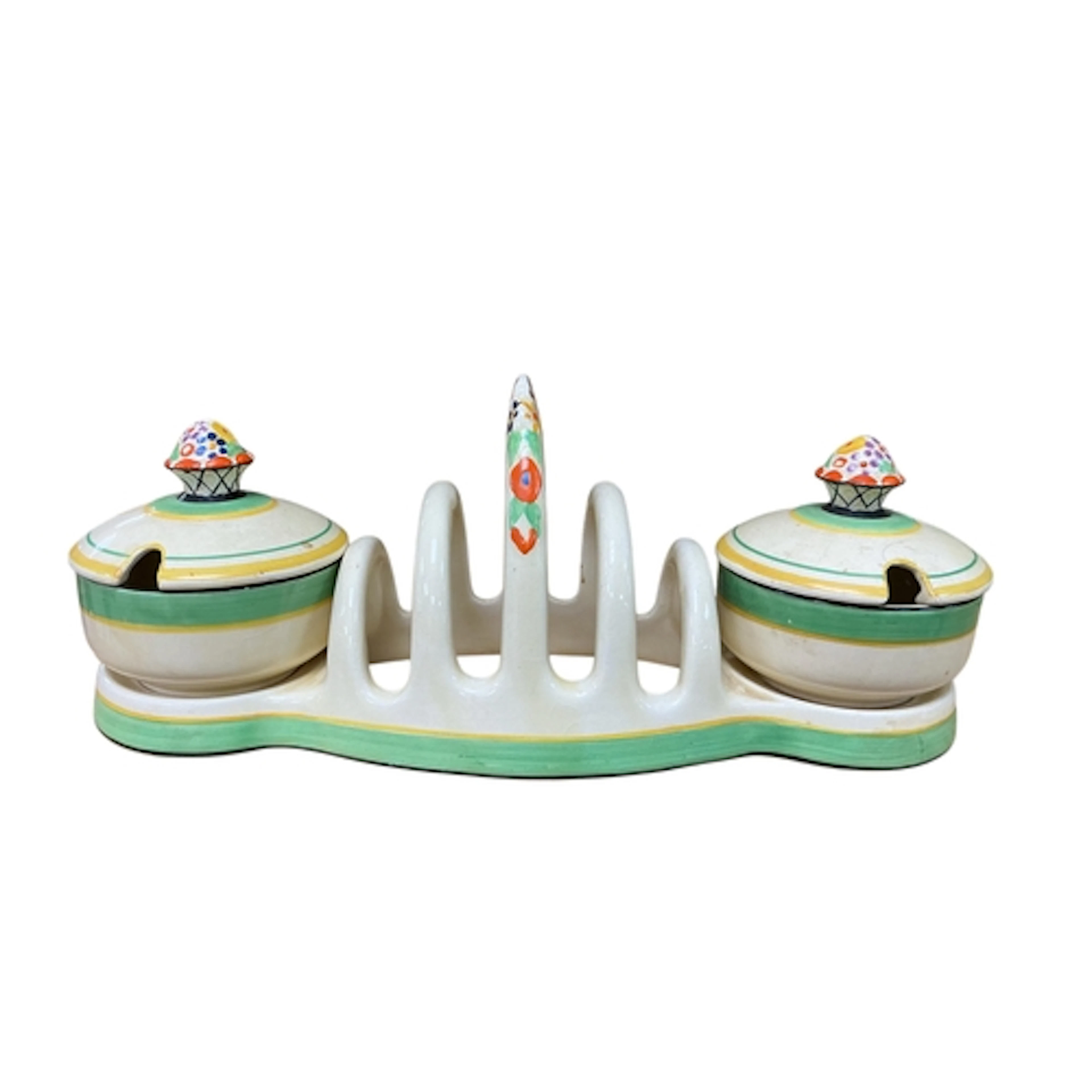 A Royal Venton Ware pottery toast rack and preserve jar brea...