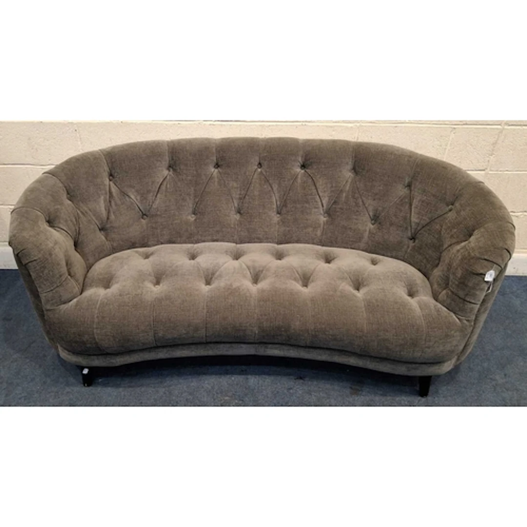 A MODERN CURVED SOFA, with grey buttoned upholstery (width ...