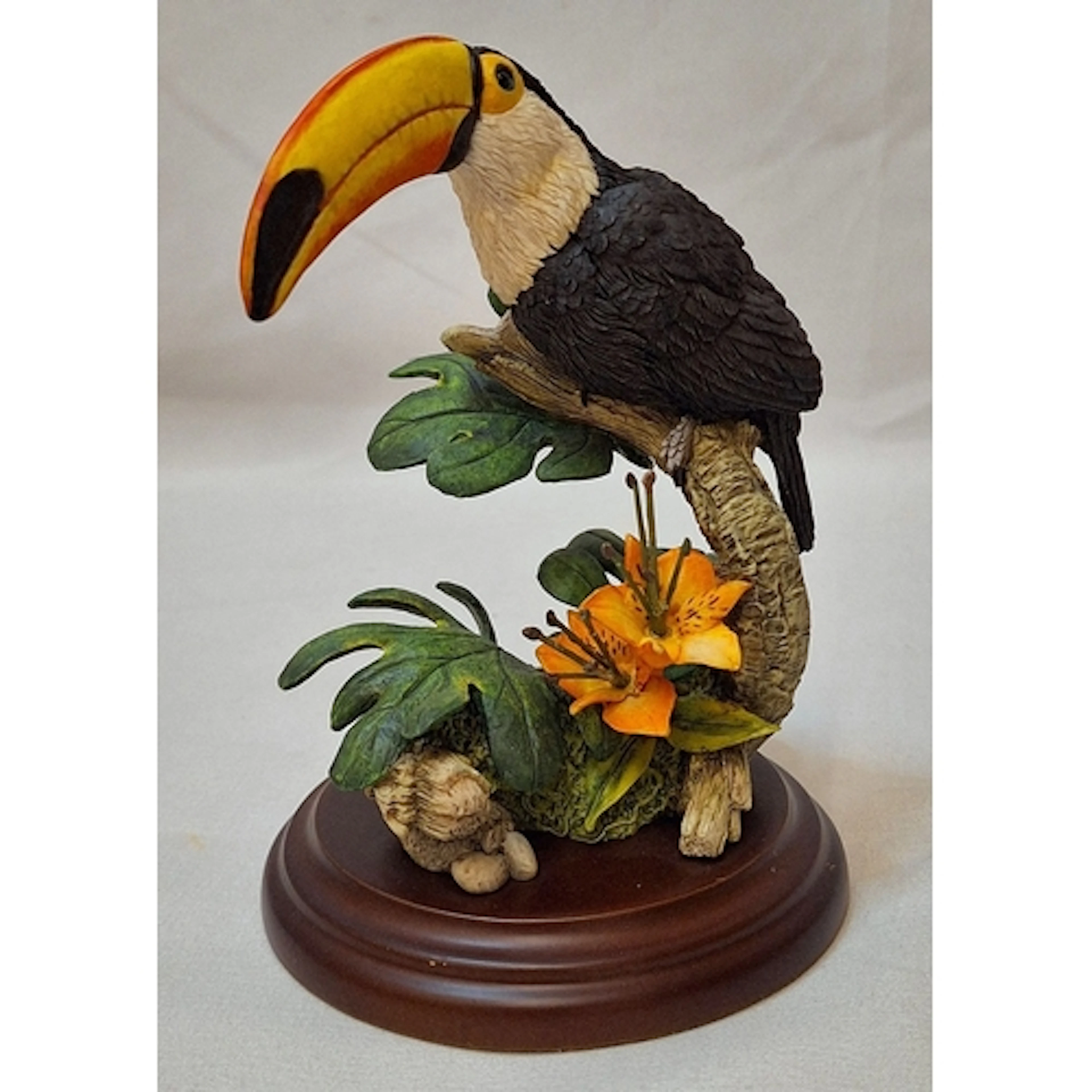 Country Artists Toucan on wooden plinth 'Toucan' Sculpted by...