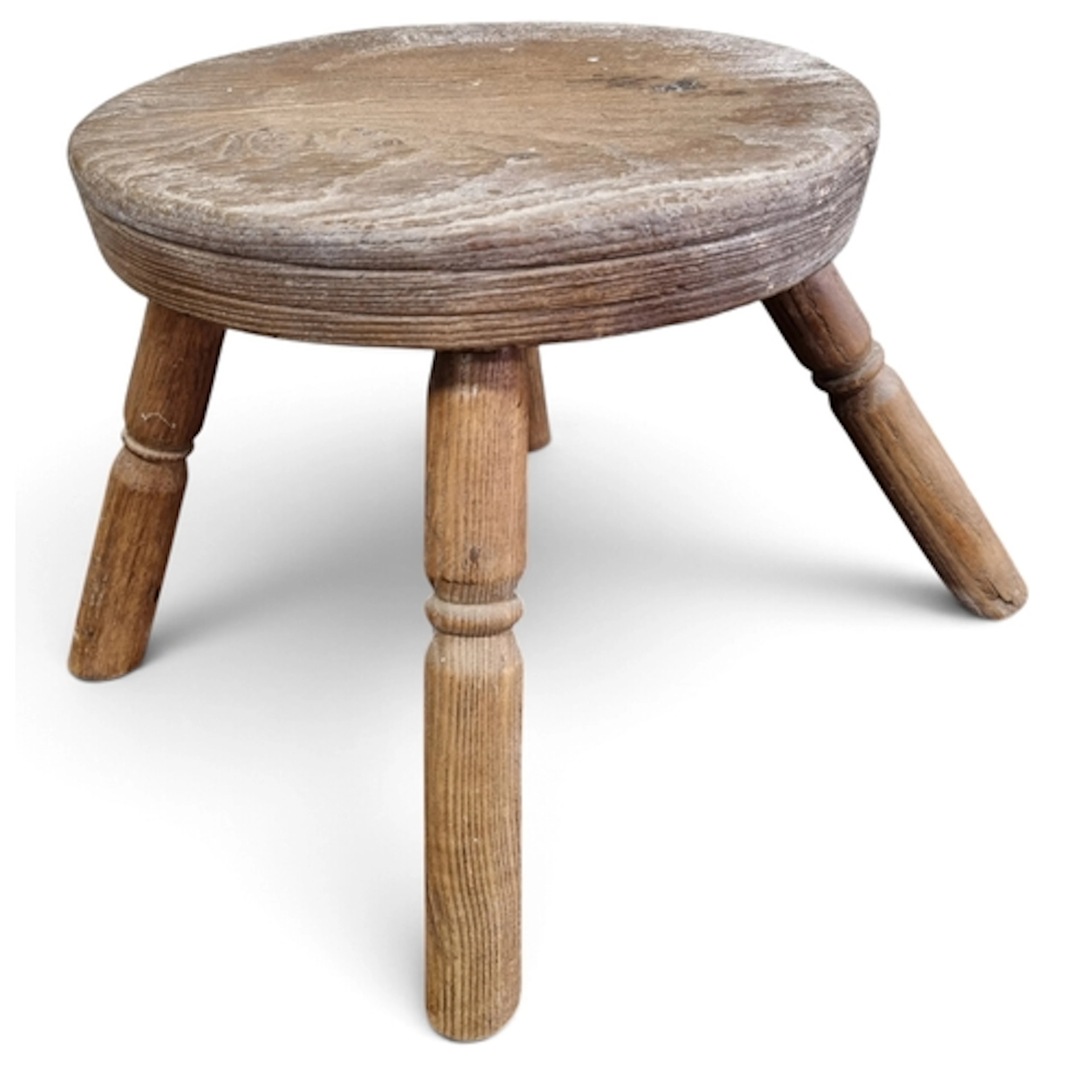 An early 1800's Irish Vernacular Elm Stool with four oak tur...