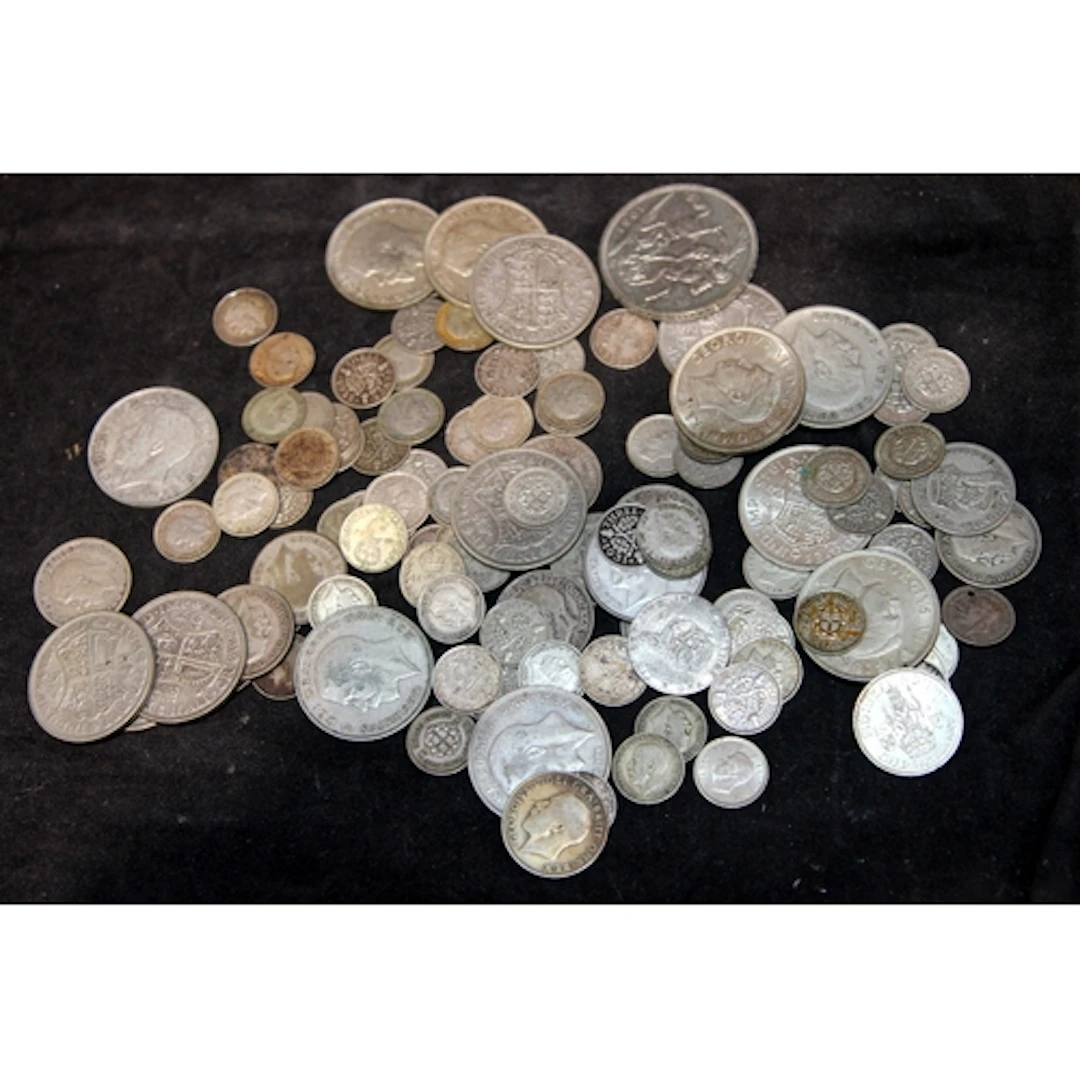 A collection of George V and George VI 0.500 silver GB coins...