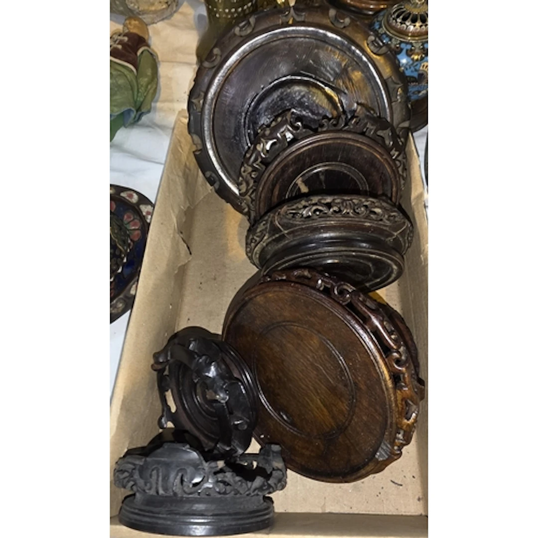 Seven Chinese hardwood stands, various designs and sizes