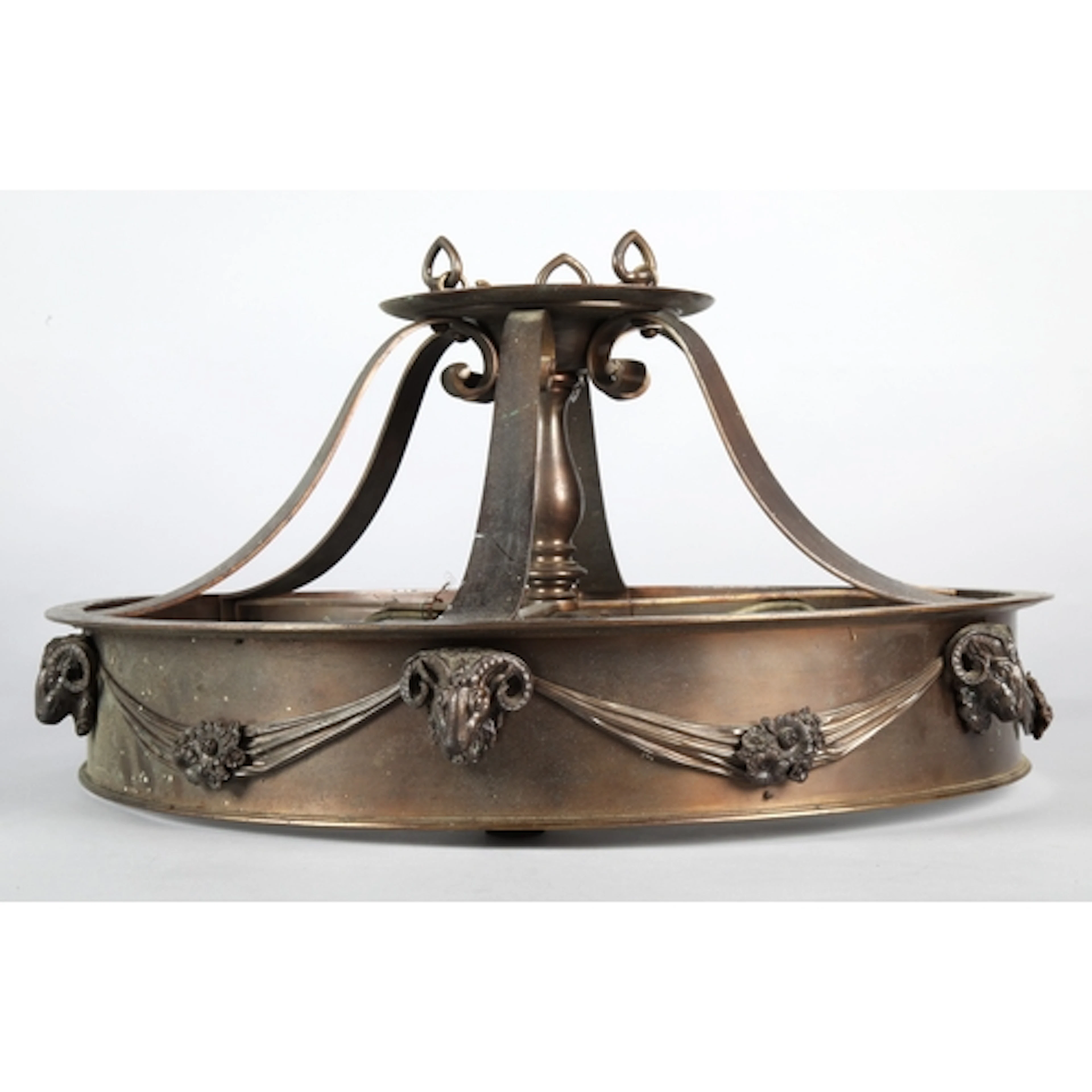 Copper chandelier with ram and floral decoration.