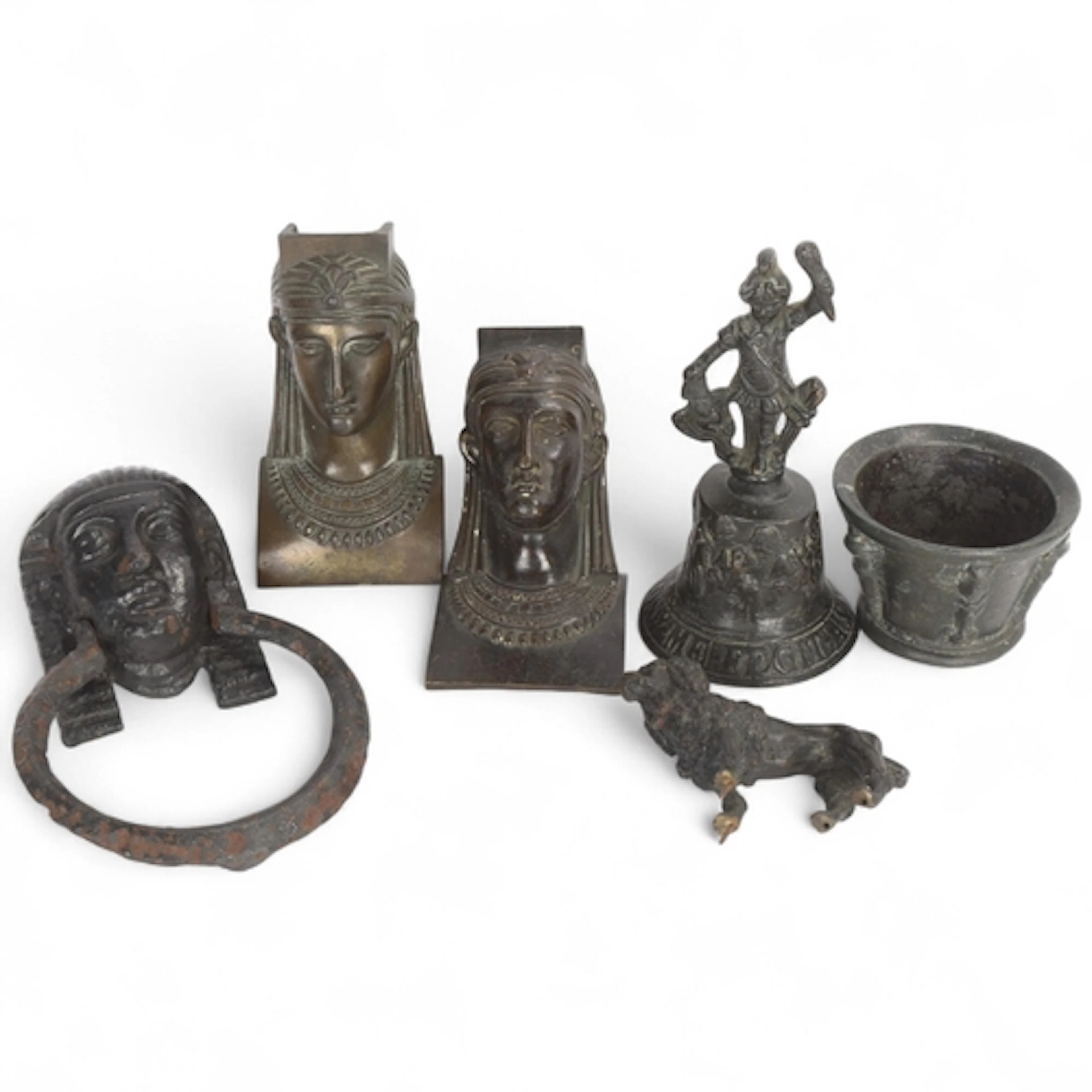 A cast-iron Egyptian Revival door knocker, various bronze fu...