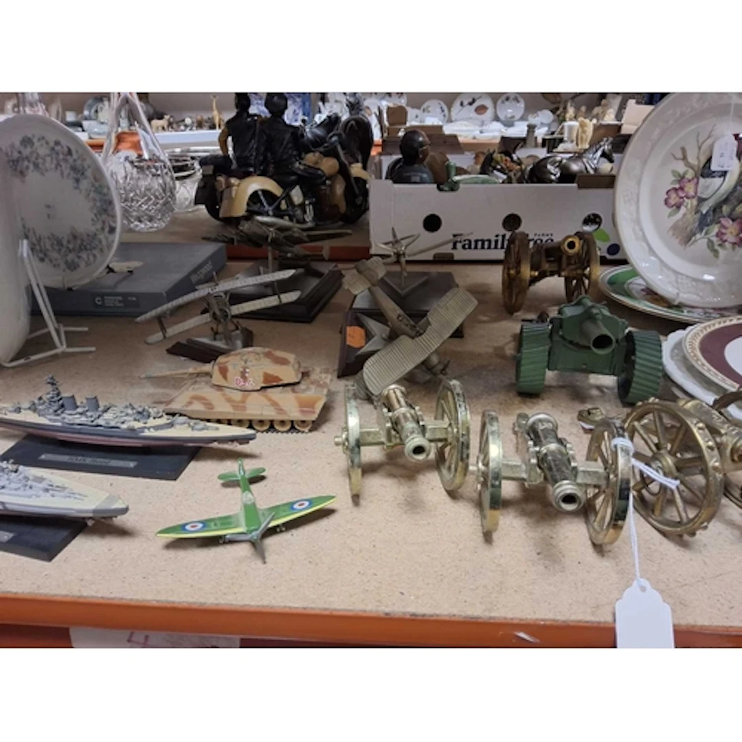 A COLLECTION OF MILITARY MODELS to include five cannon ornam...