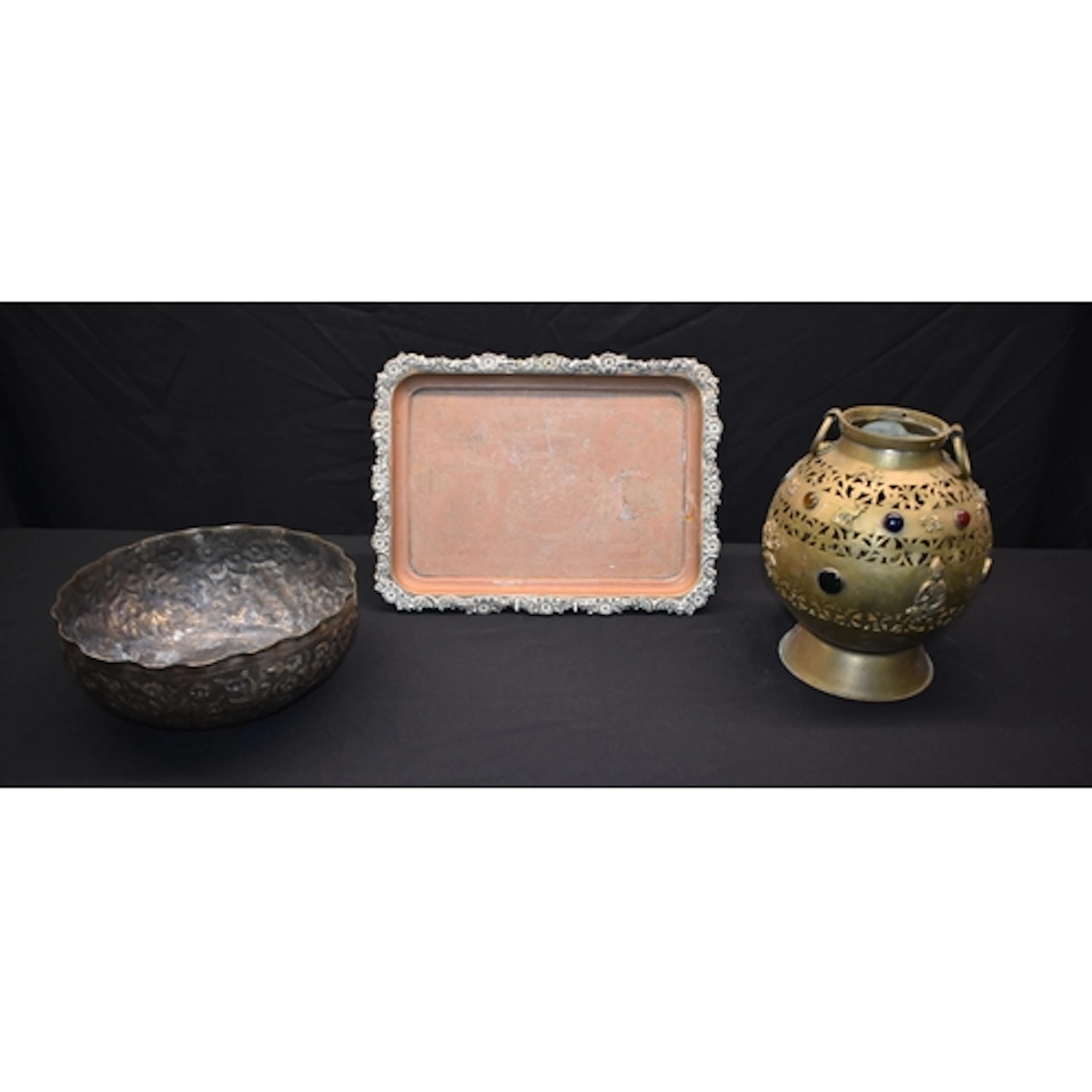 A Central Asian brass table lamp together with a Cairo ware ...