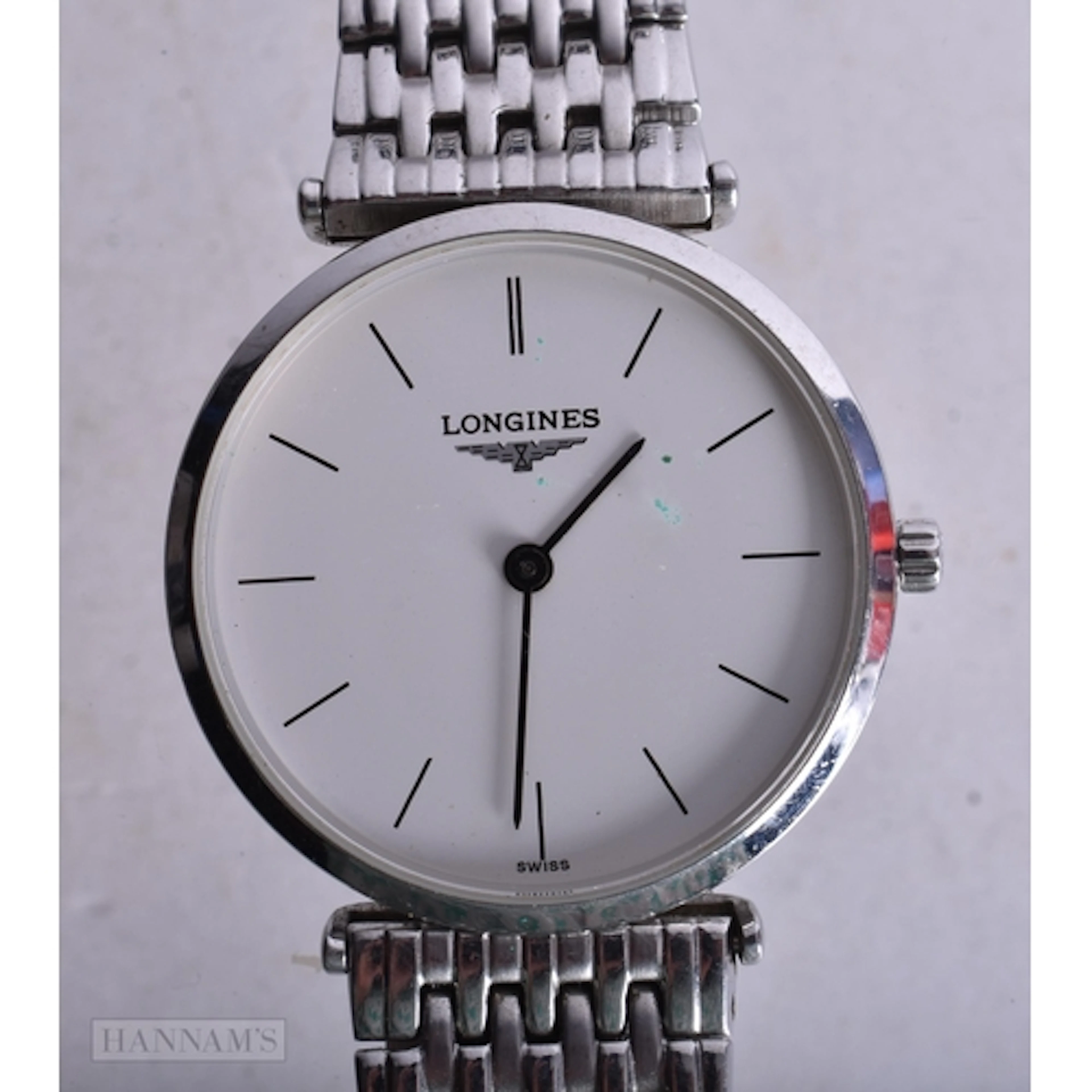 A LONGINES WRIST WATCH. Untested. 3.5 cm wide.