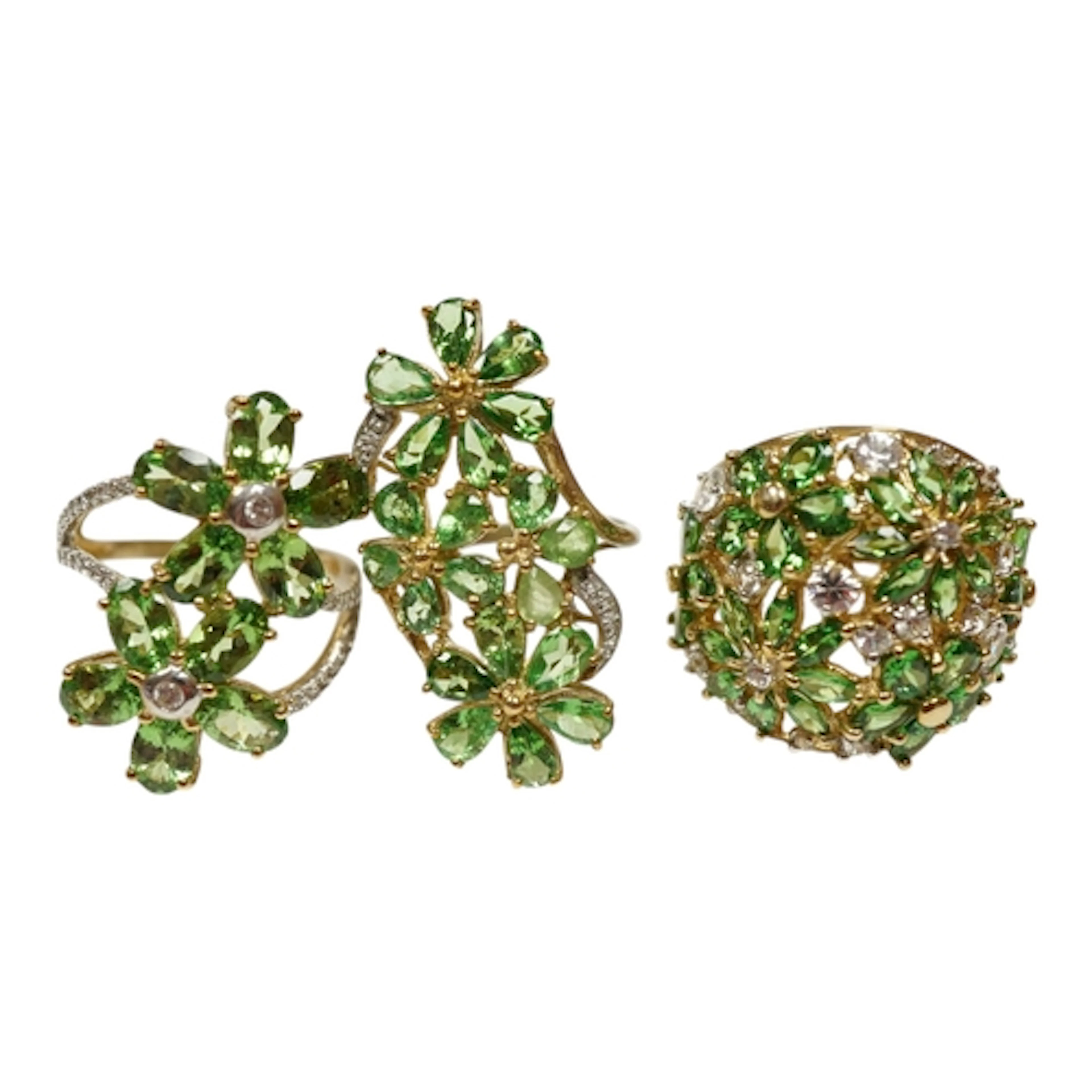 Three assorted recent 9ct gold, tsavorite garnet and simulat...