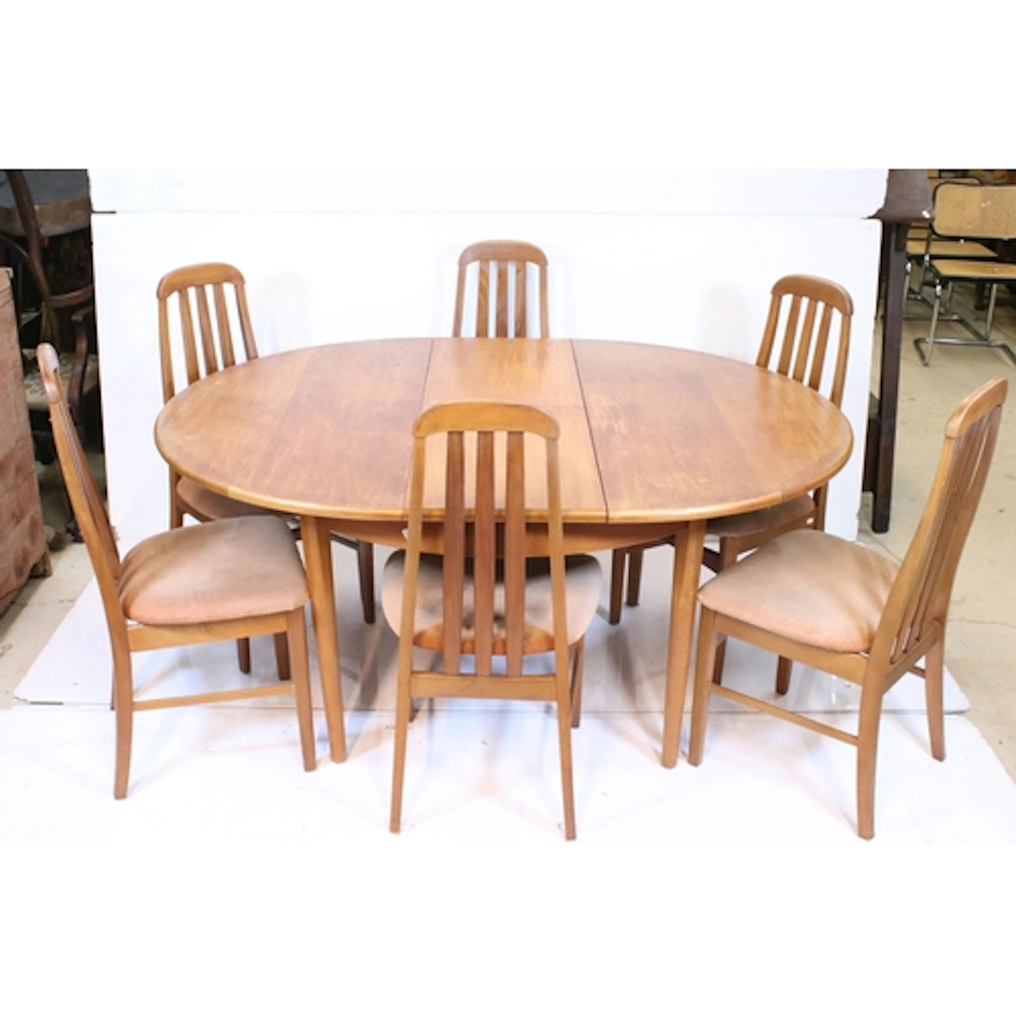 Mid 20th century teak dining table and chairs, the circular ...