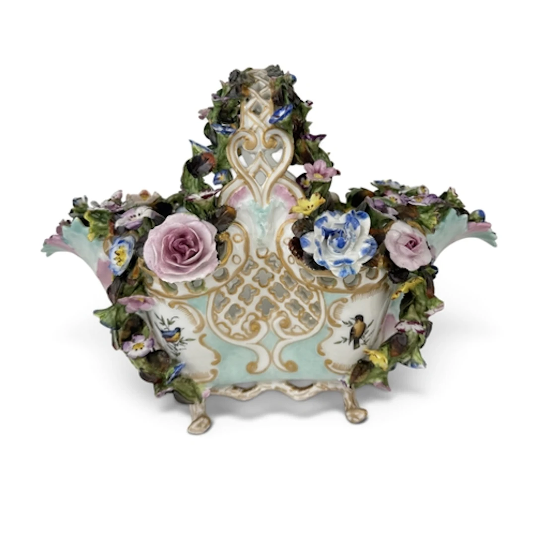 A GERMAN PORCELAIN SHAPED OVAL BASKET, IN MEISSEN STYLE, Enc...
