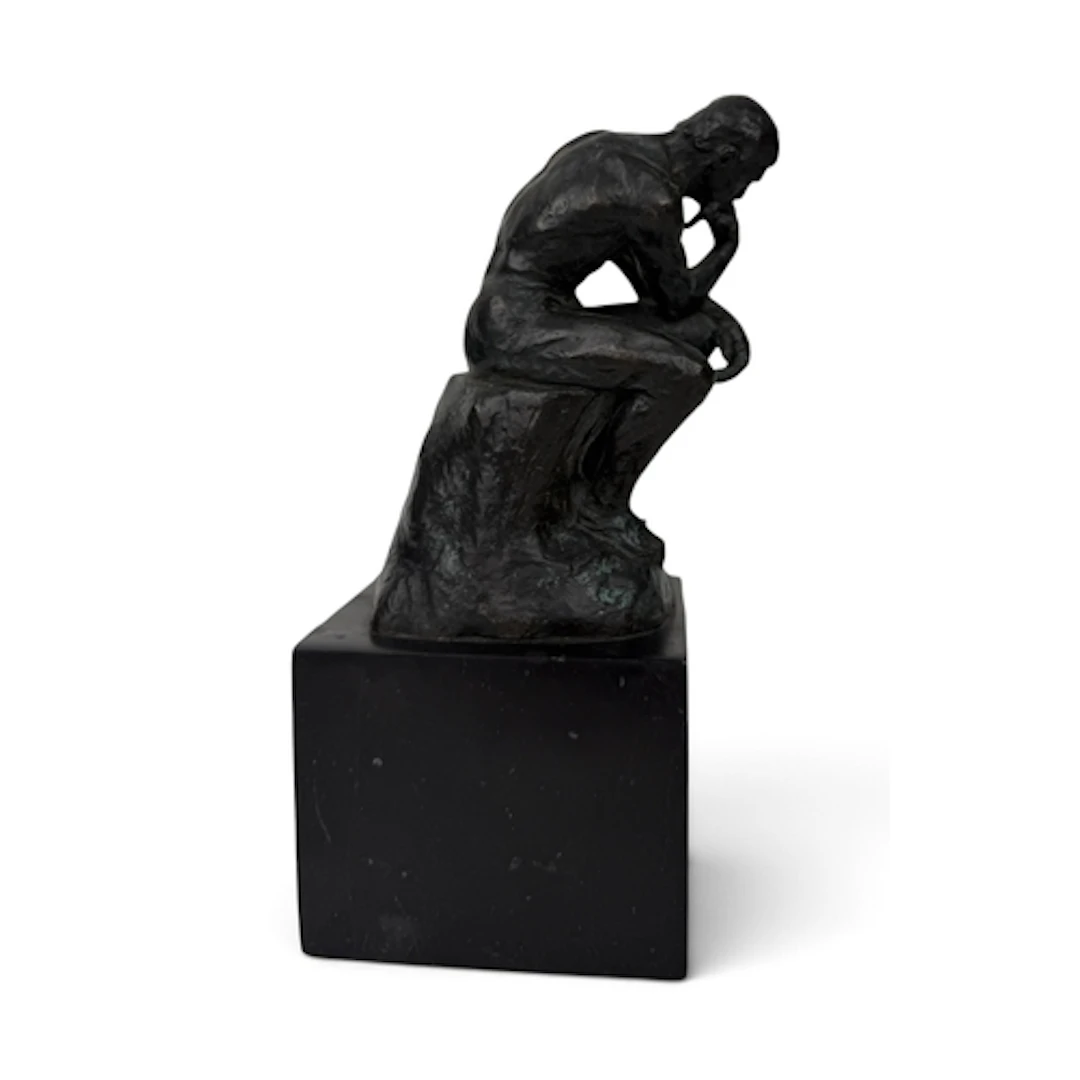 AFTER AUGUSTE RODIN: THE THINKER Bronze sculpture on stone b...
