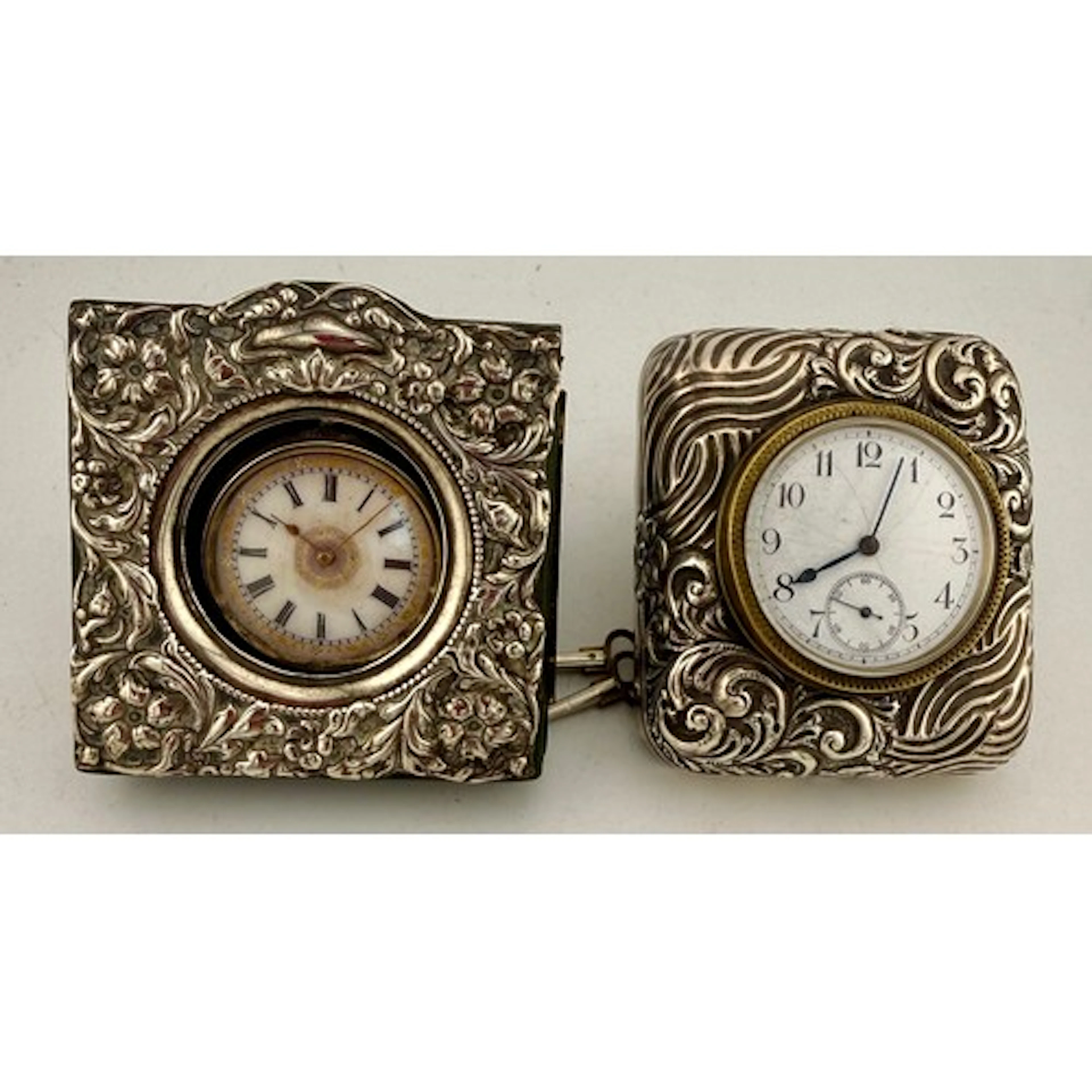 Two hallmarked silver watch cases, Birmingham 1902, one cont...