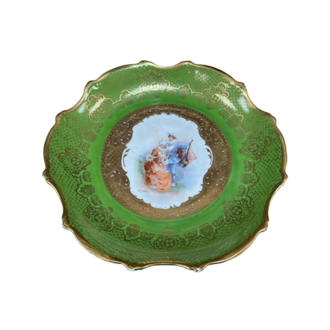 A Vienna style porcelain dish decorated with a lady and gall...