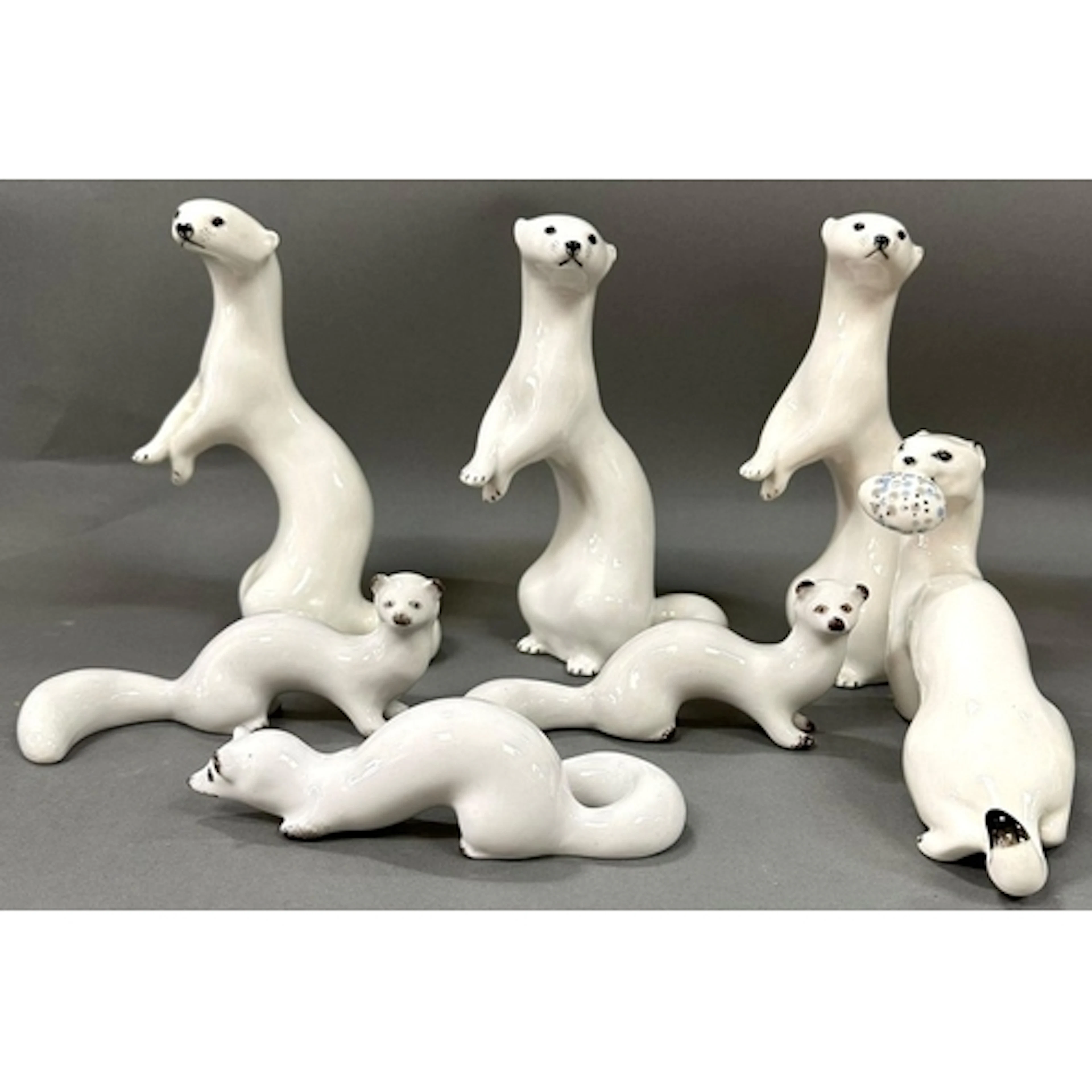 A selection of porcelain stout ferrets made and stamped in t...