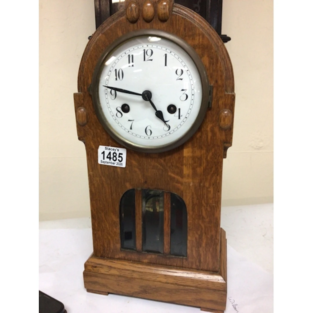 A continental Jugendstil influence oak mantel clock with a v...