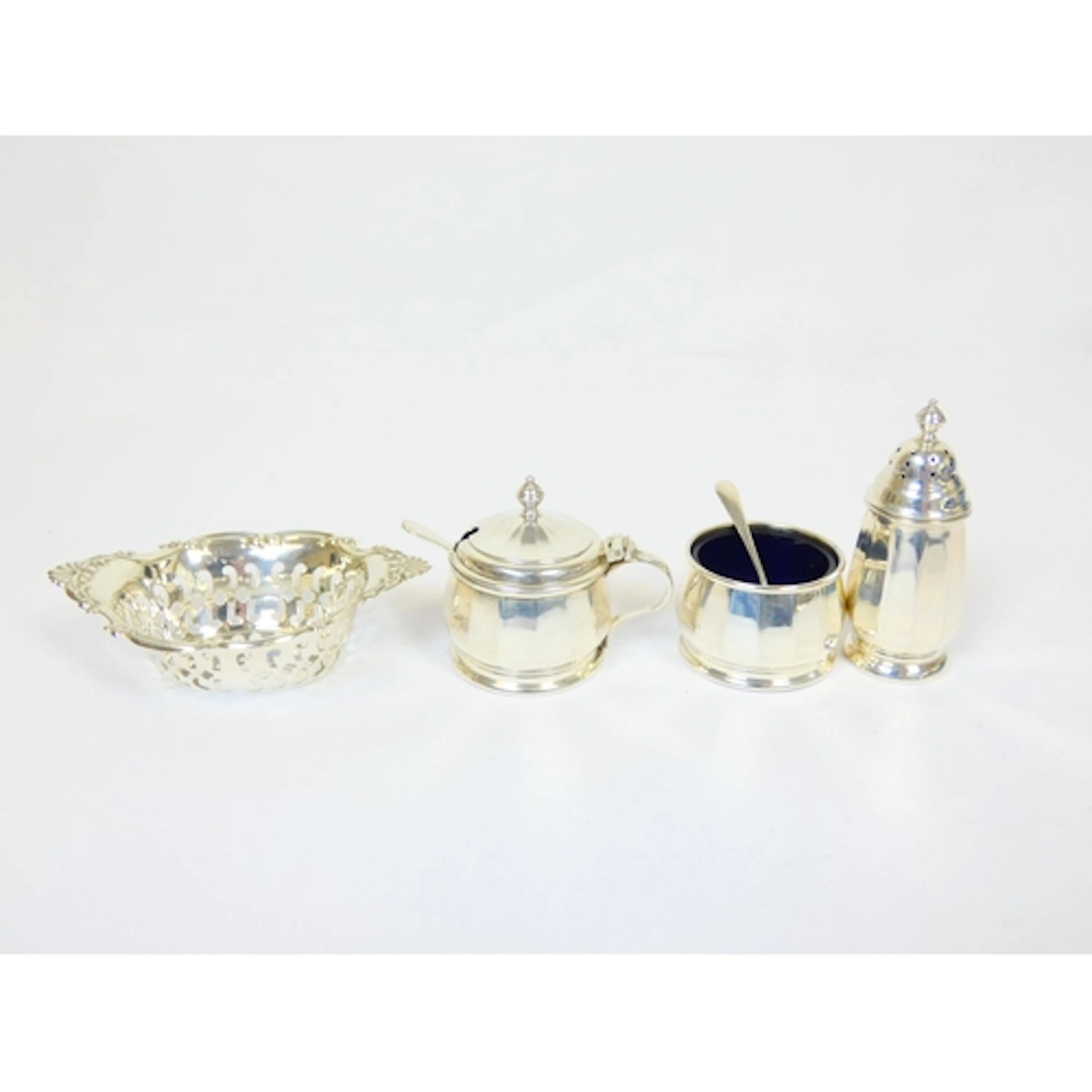 Collection of sterling silver items by Adie Brothers Ltd, Bi...