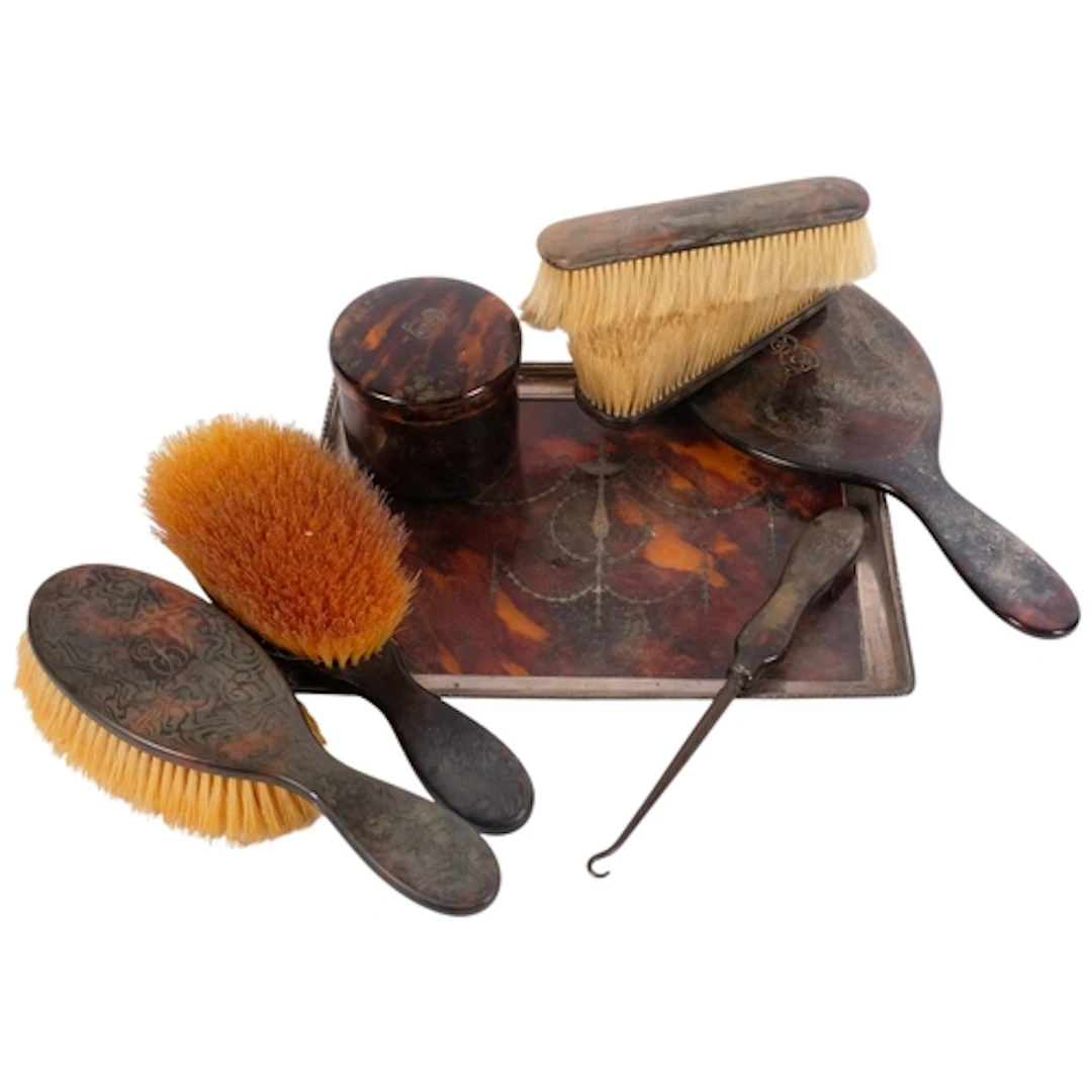 A selection of interesting tortoiseshell and silver plated t...