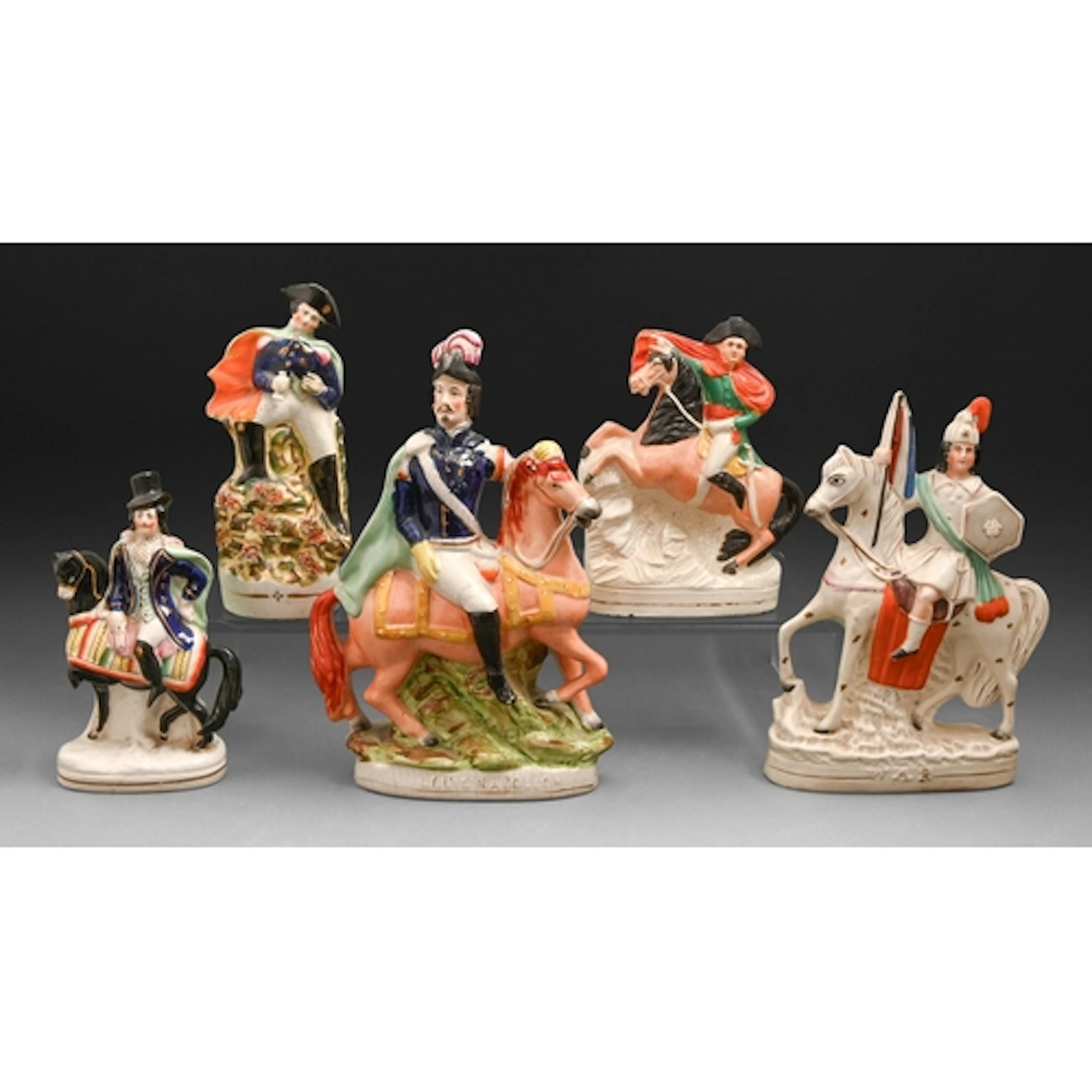 Four Staffordshire portrait figures of Louis Napoleon III, N...