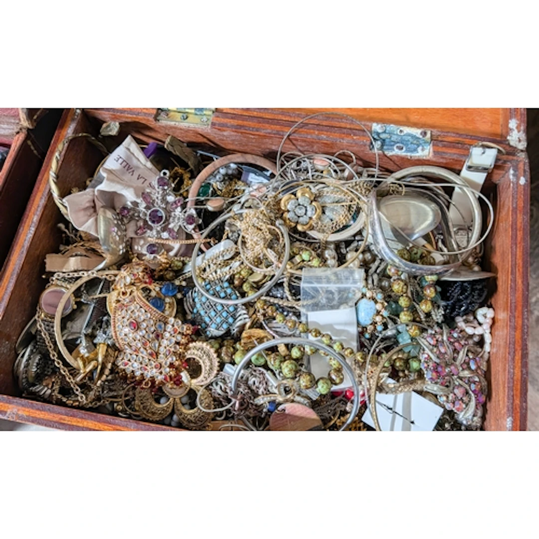 Two cases of assorted ladies costume jewellery to include In...
