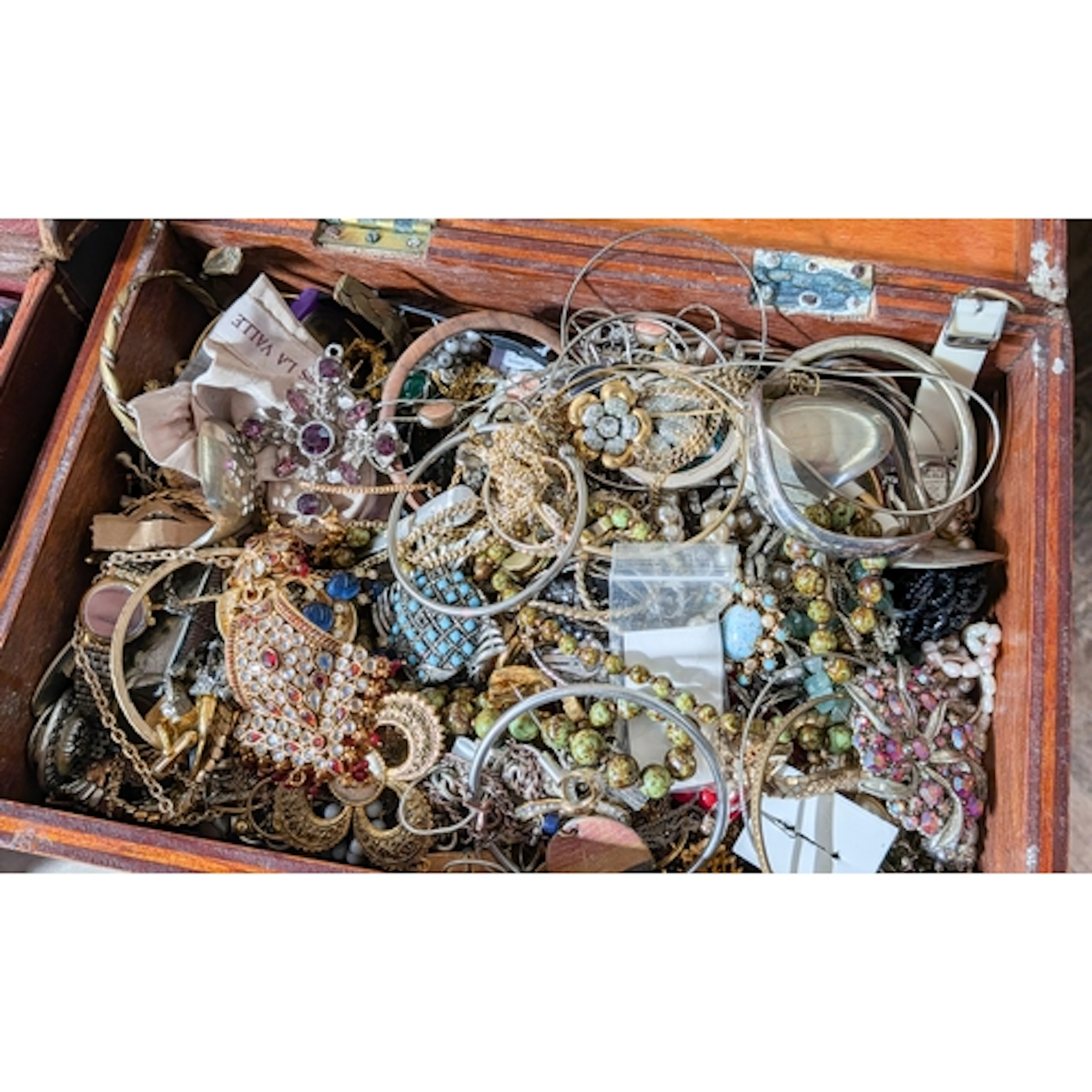 Two cases of assorted ladies costume jewellery to include In...