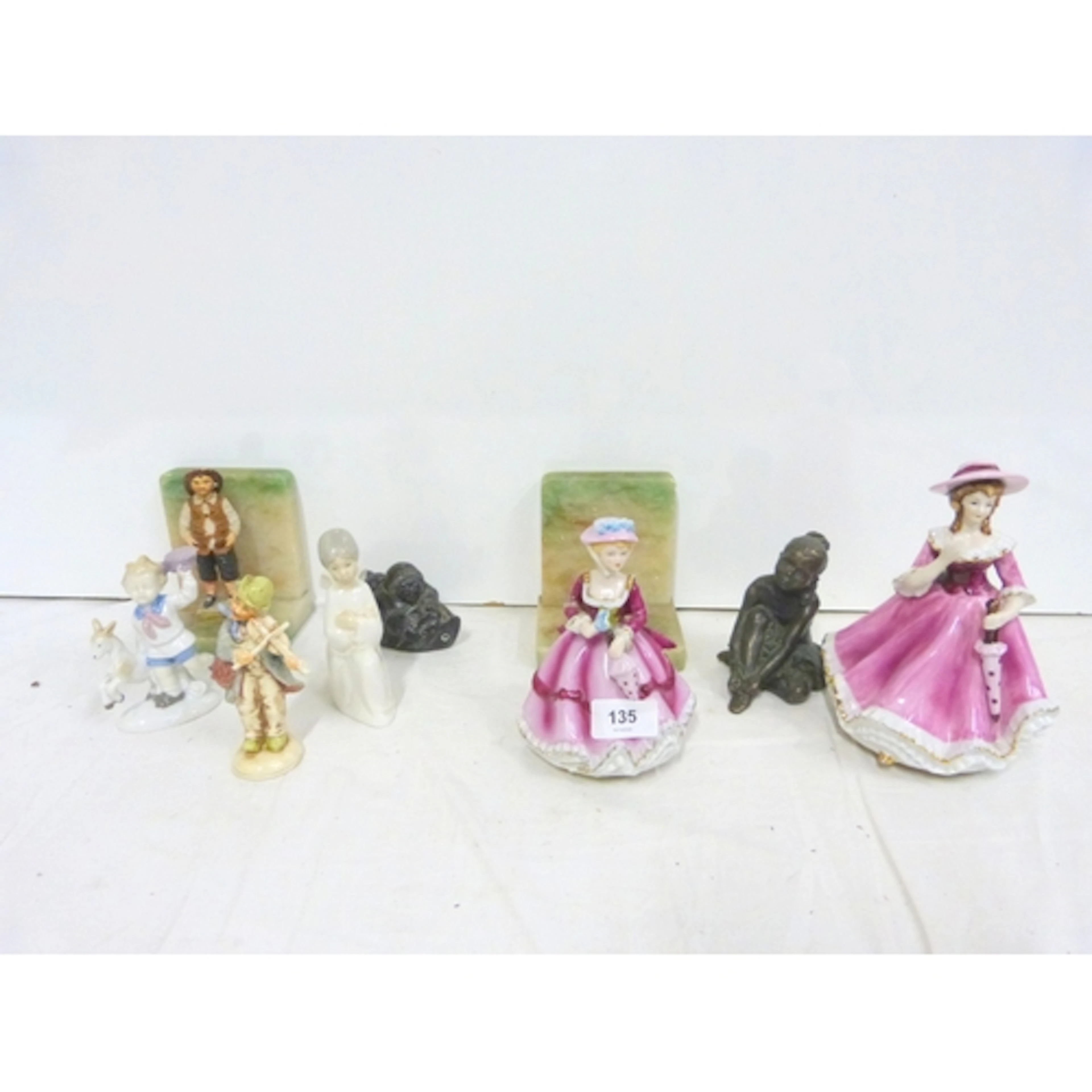 Collection of various figures to include Nao and two musical...