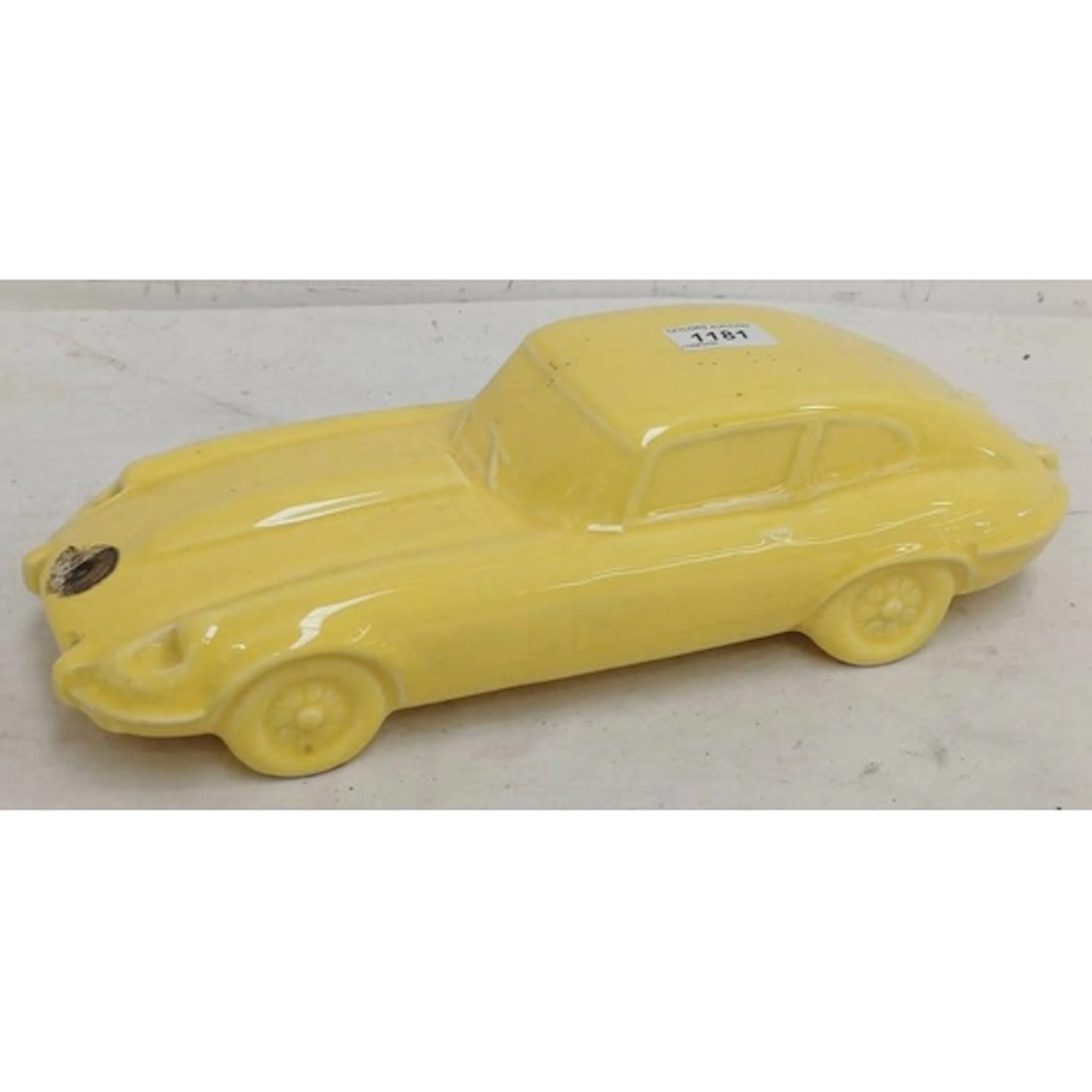AUTOMOBILIA - DARTMOUTH POTTERY YELLOW CERAMIC MODEL POSSIBL...