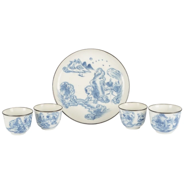 A set of four Chinese bleu de Huê blue and white teabowls an...