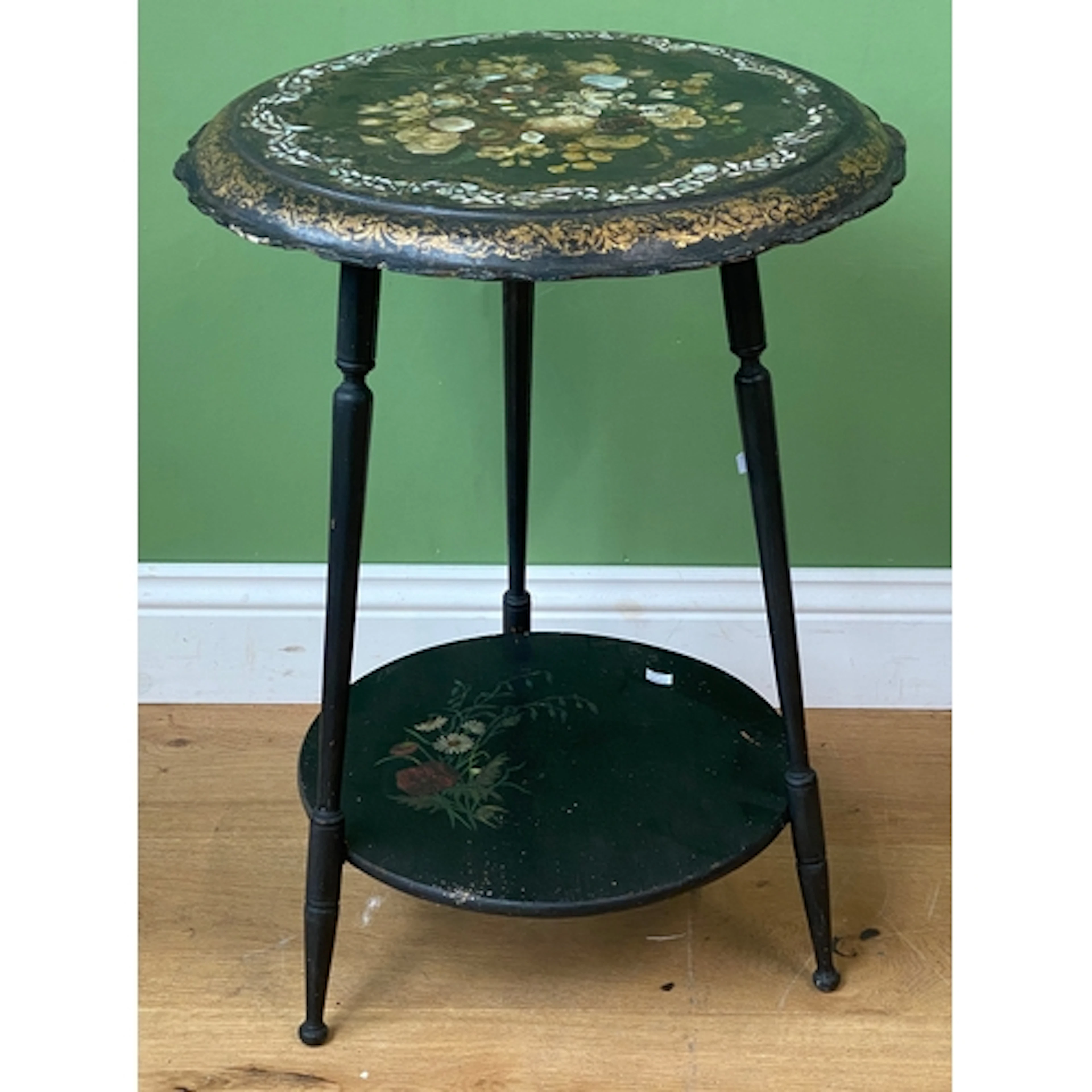 A Victorian papier mache circular side table in the manner o...