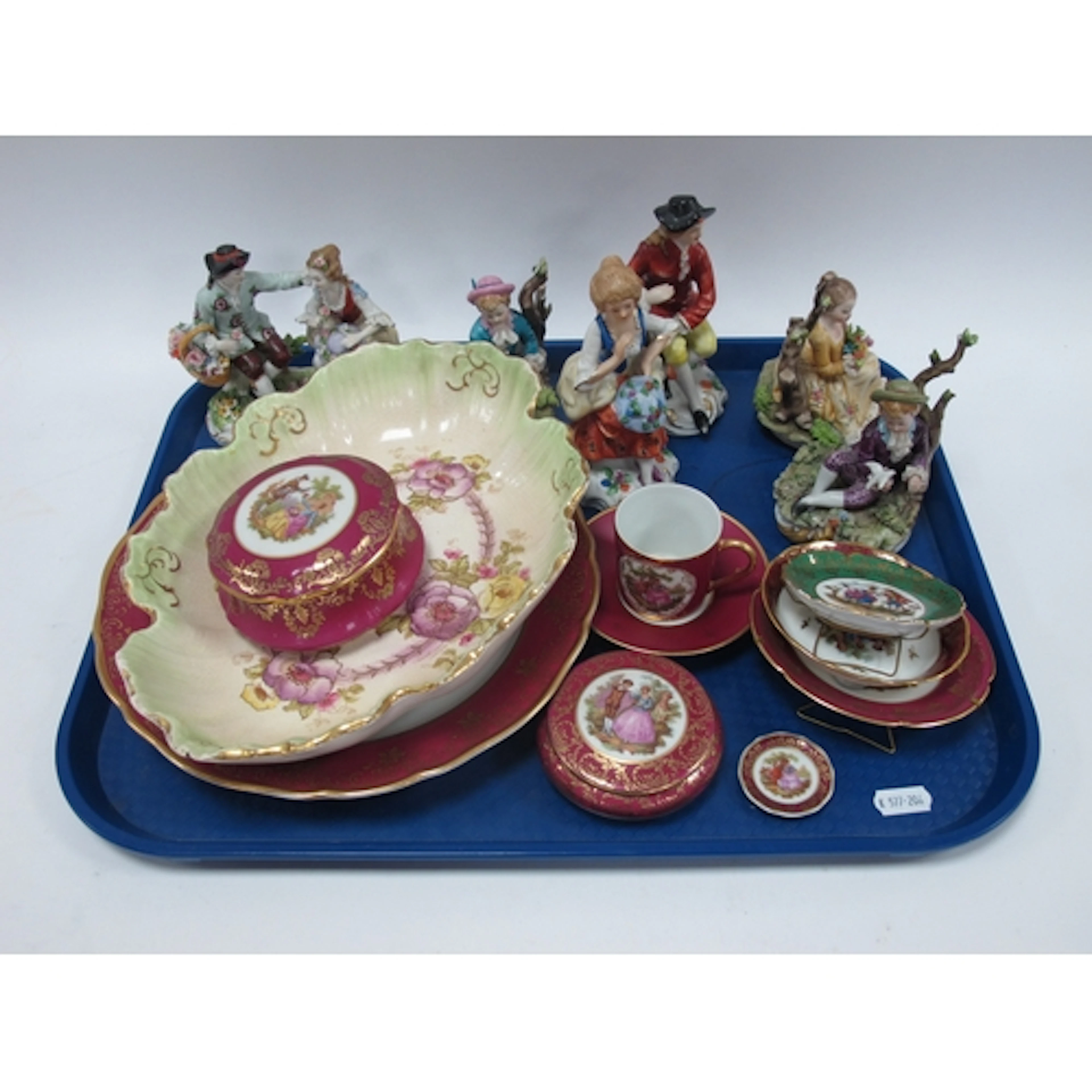 Sitzendorf Figurine Group, of a boy and girl sat on tree stu...