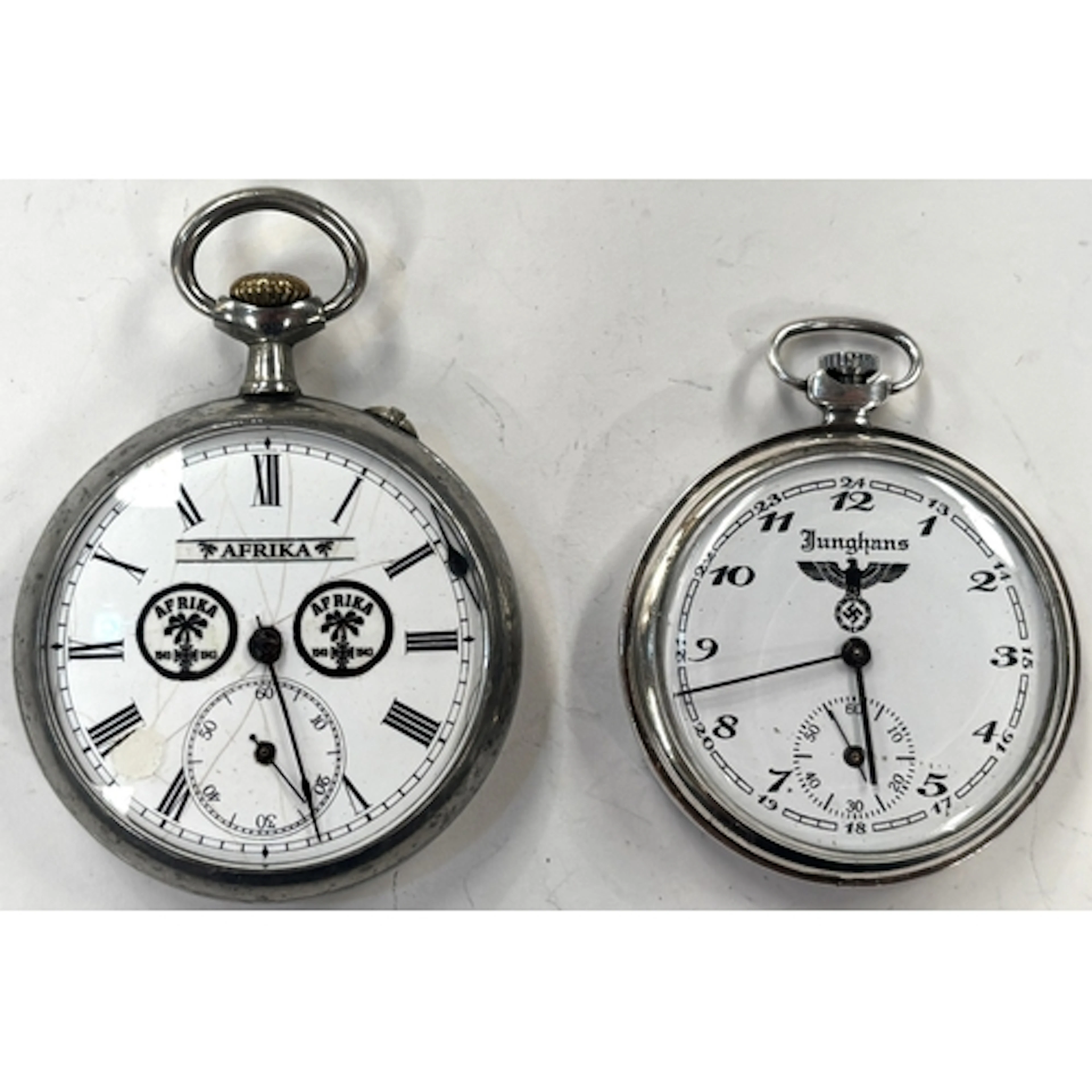 Two WWII period German pocket watches, one with Africa Corps...