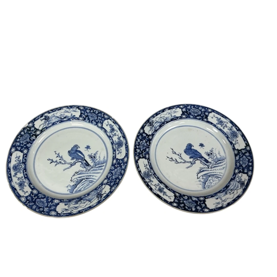 A pair of 18th century Chinese blue and white plates decorat...